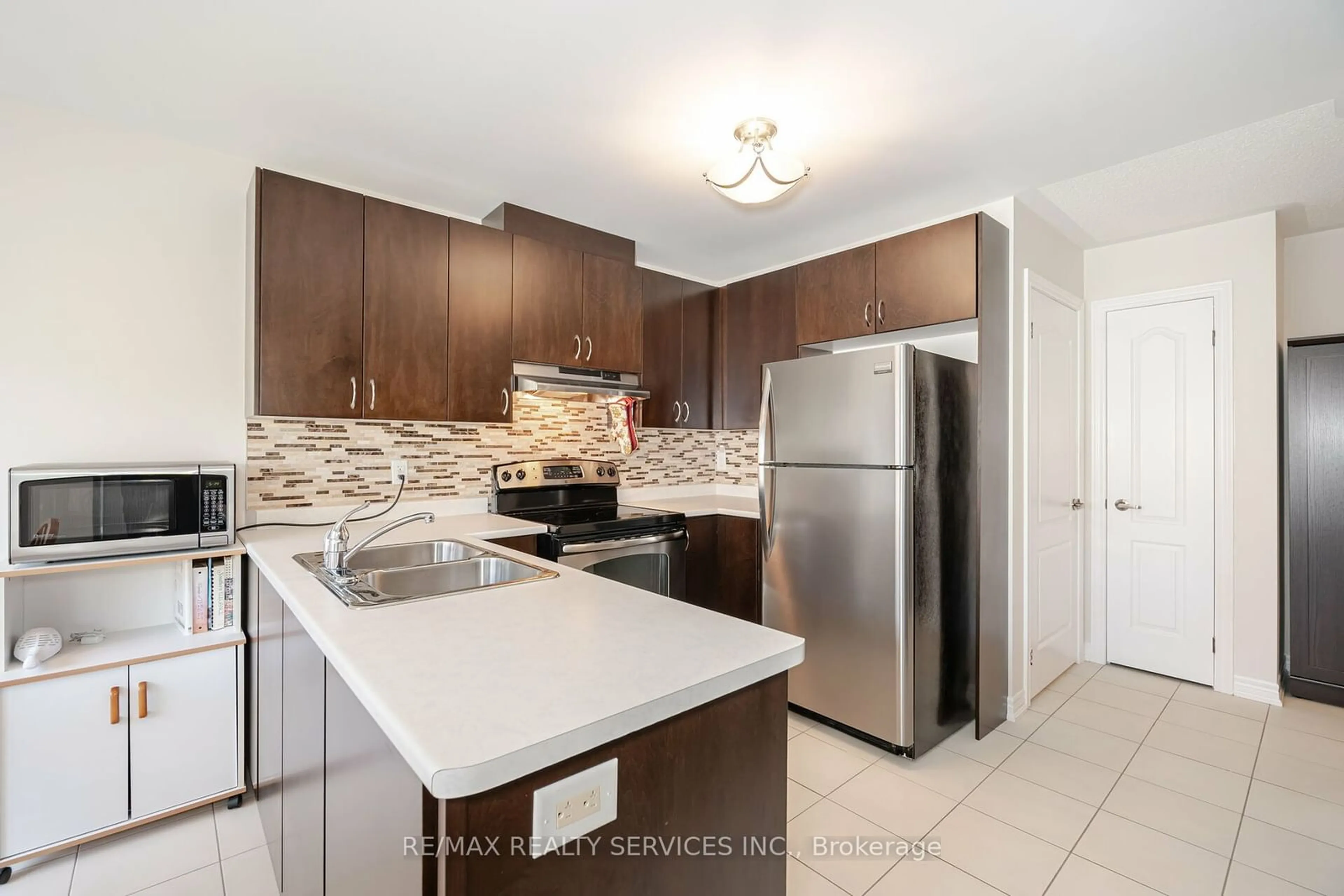 Standard kitchen, ceramic/tile floor for 17 Lacorra Way #43, Brampton Ontario L6R 3P2