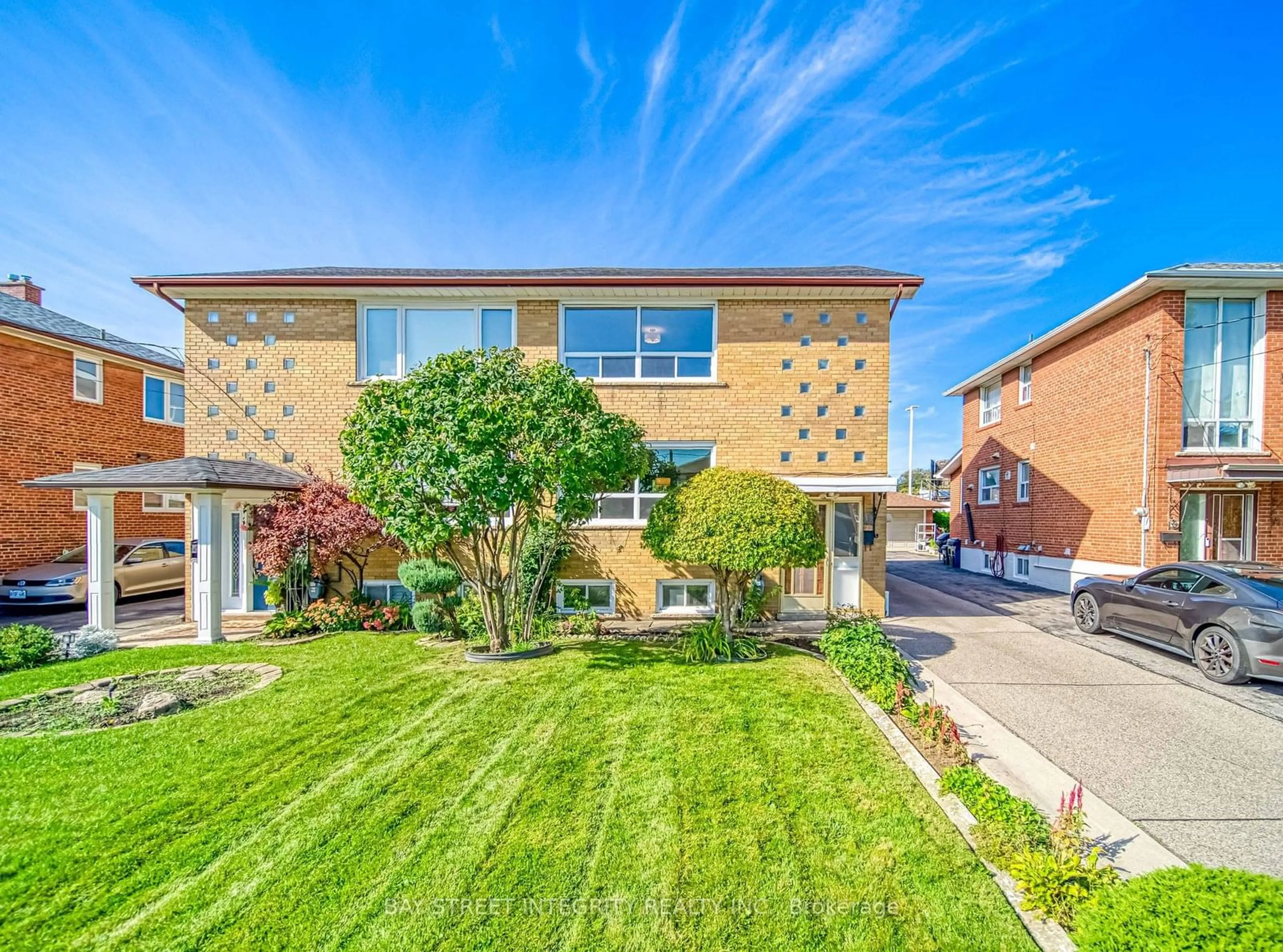 A pic from outside/outdoor area/front of a property/back of a property/a pic from drone, street for 12 Martini Dr, Toronto Ontario M6M 4X5