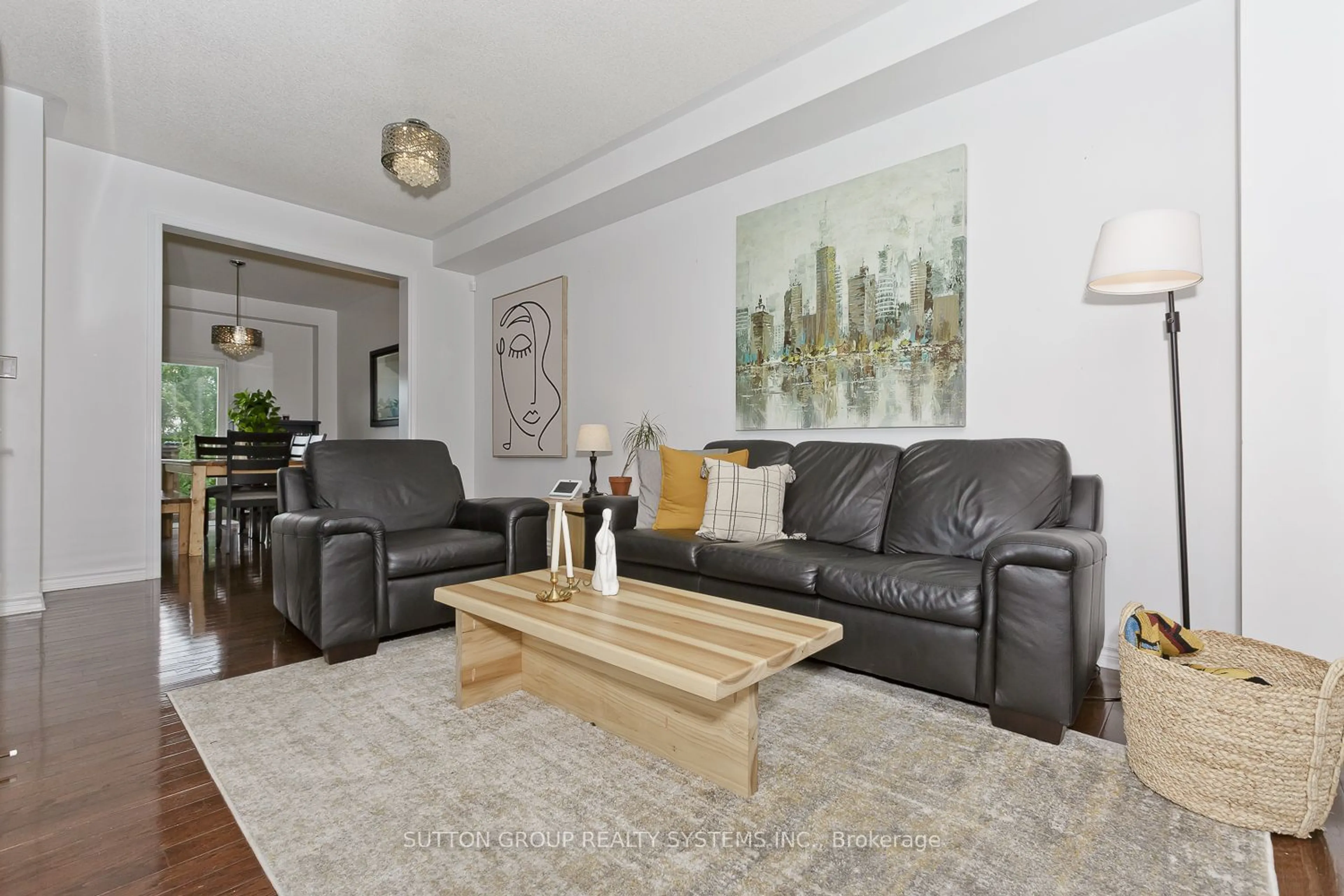 Living room with furniture, wood/laminate floor for 355 Hobbs Cres, Milton Ontario L9T 0J3