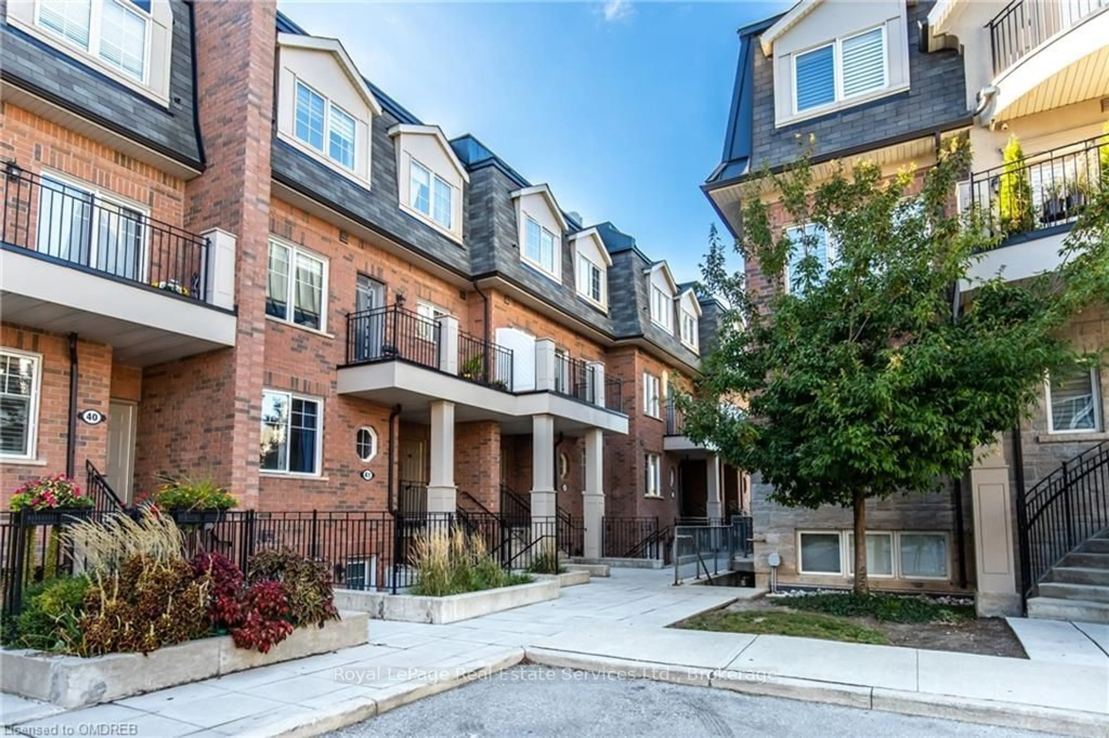 Home with brick exterior material, street for 2420 BARONWOOD Dr #42-02, Oakville Ontario L6M 0J7