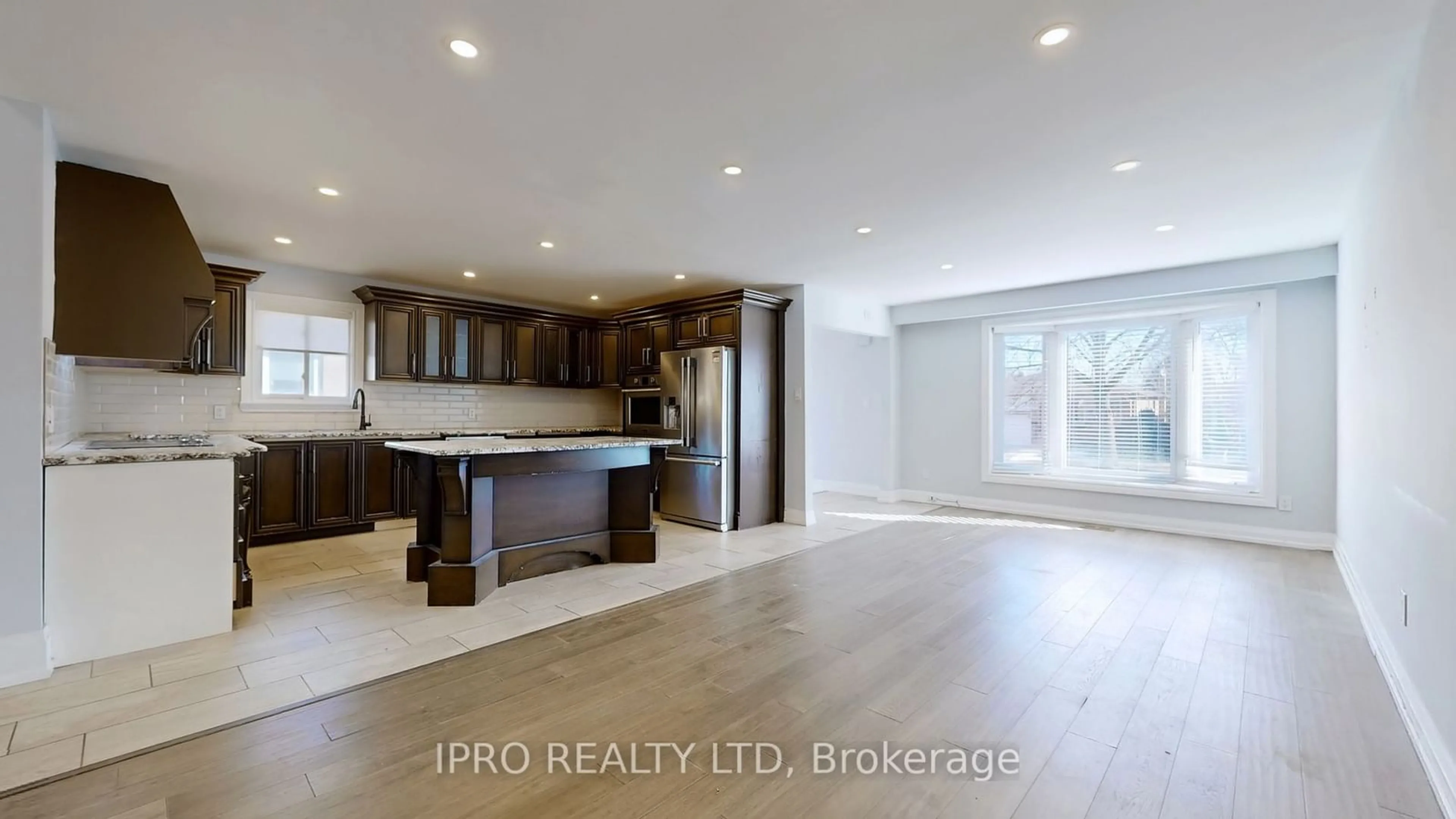 Open concept kitchen, wood/laminate floor for 349 Enfield Rd, Burlington Ontario L7T 4E7