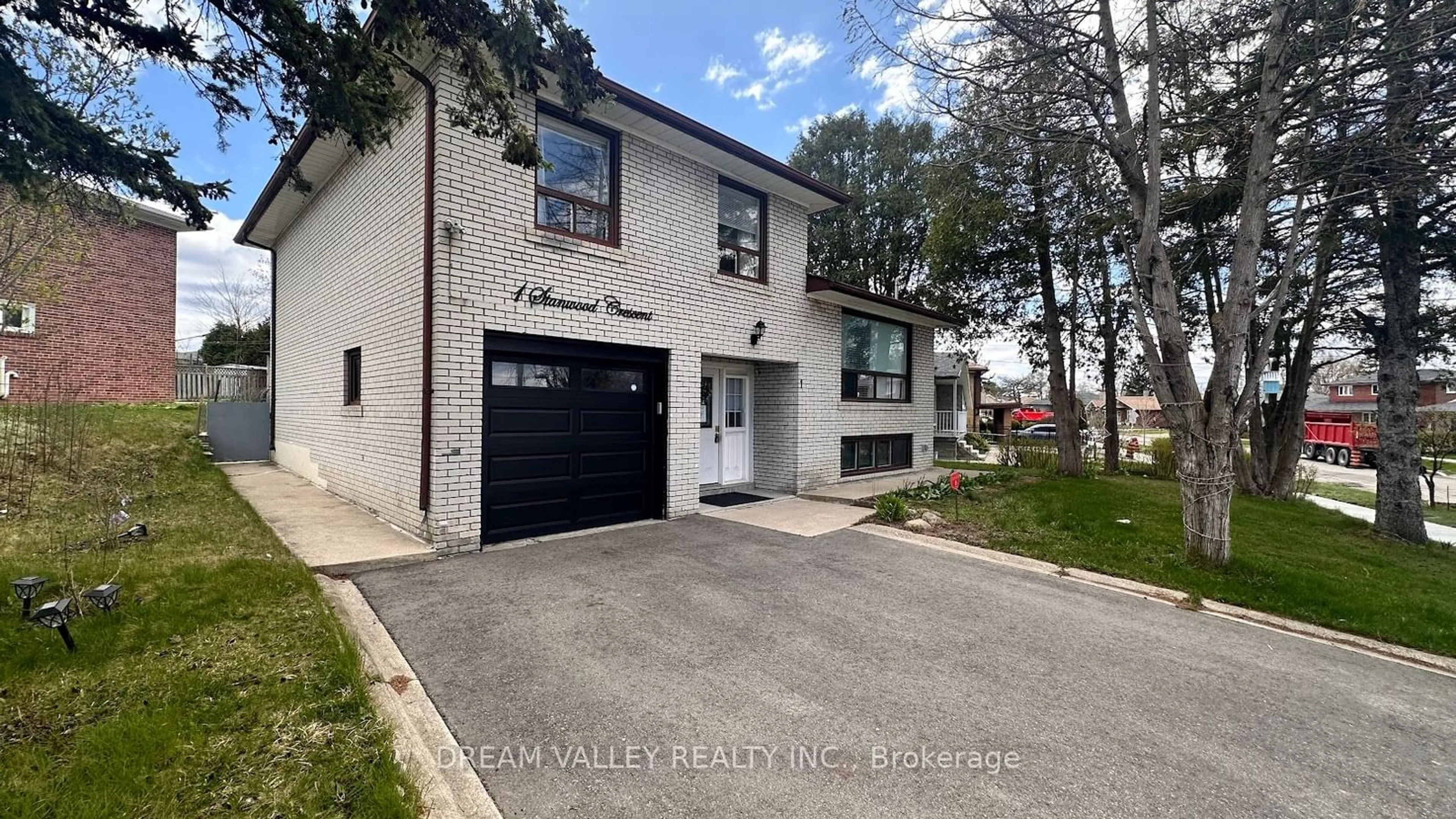 Home with brick exterior material, street for 1 Stanwood Cres, Toronto Ontario M9M 1Z8