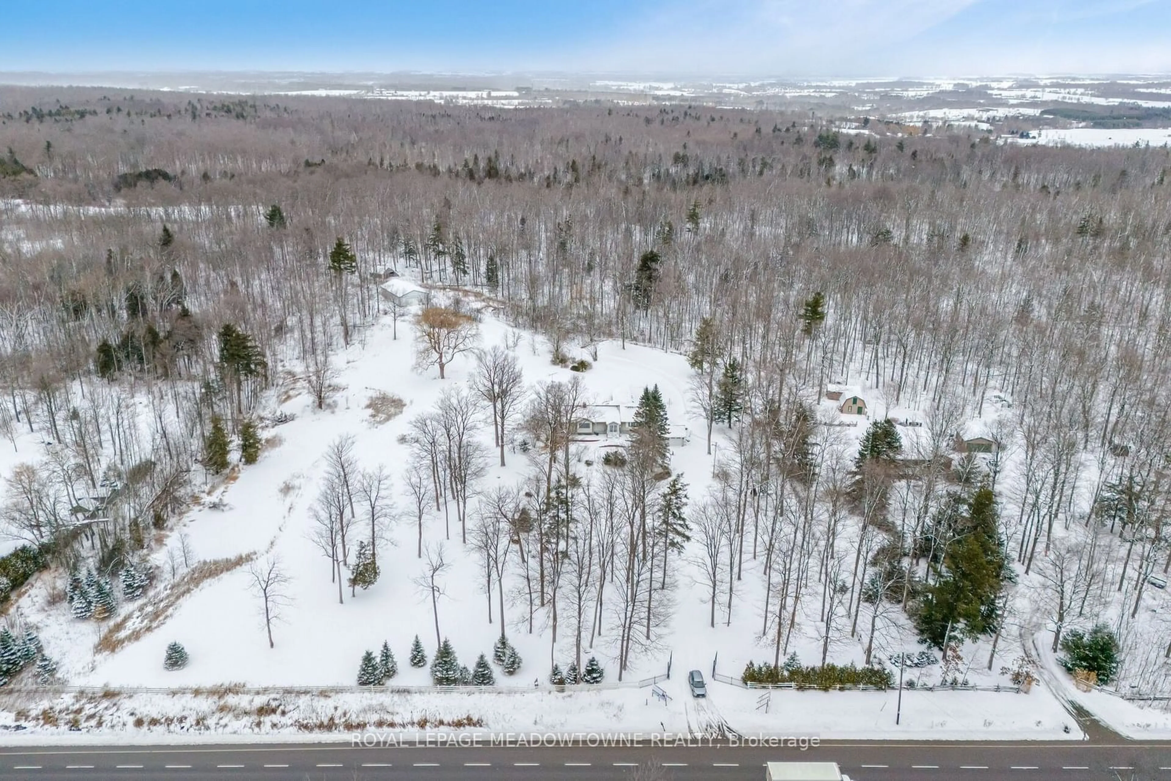 A pic from outside/outdoor area/front of a property/back of a property/a pic from drone, forest/trees view for 11255 Regional Road 25 Rd, Halton Hills Ontario L7J 2M1