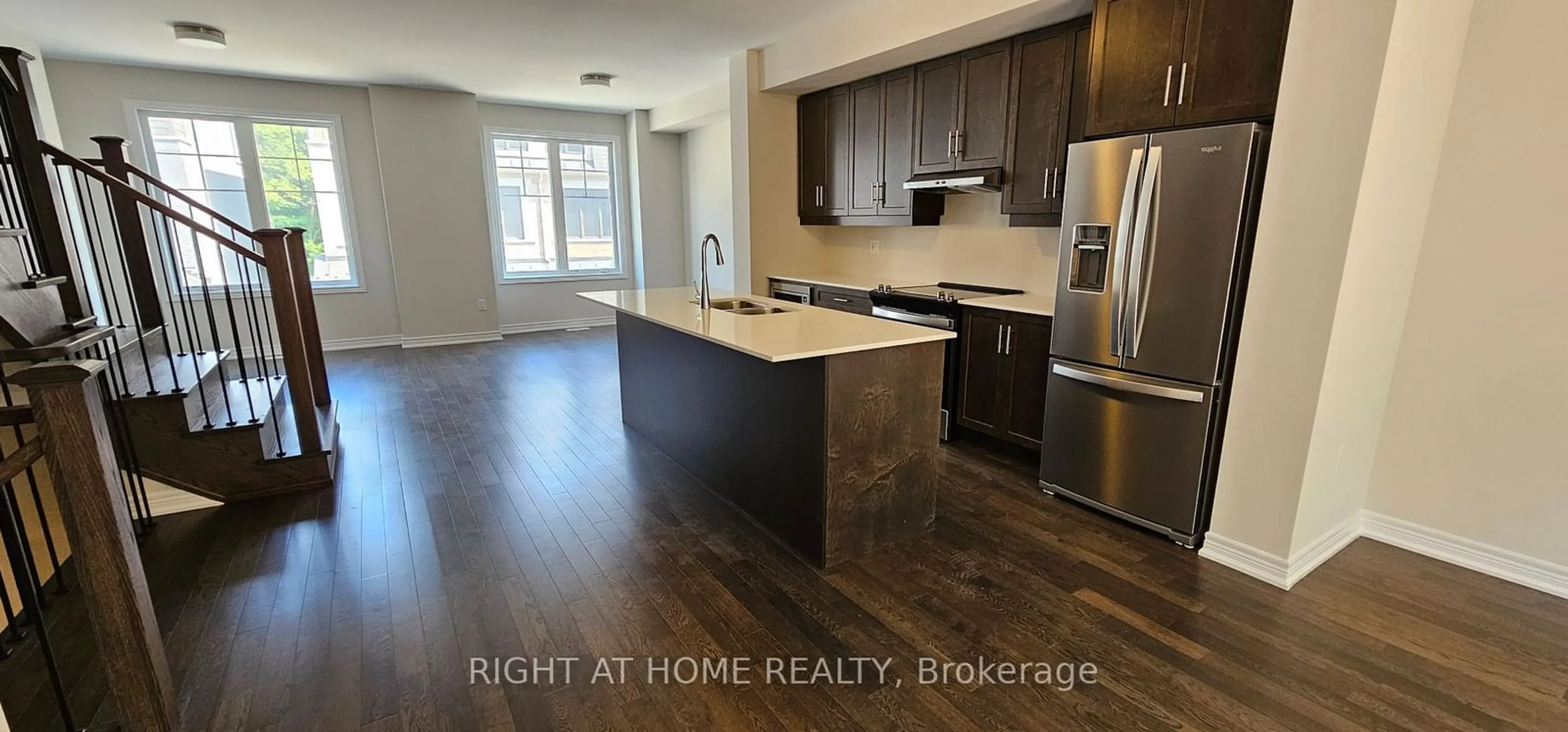 Open concept kitchen, wood/laminate floor for 34 Folcroft St, Brampton Ontario L6Y 0B6