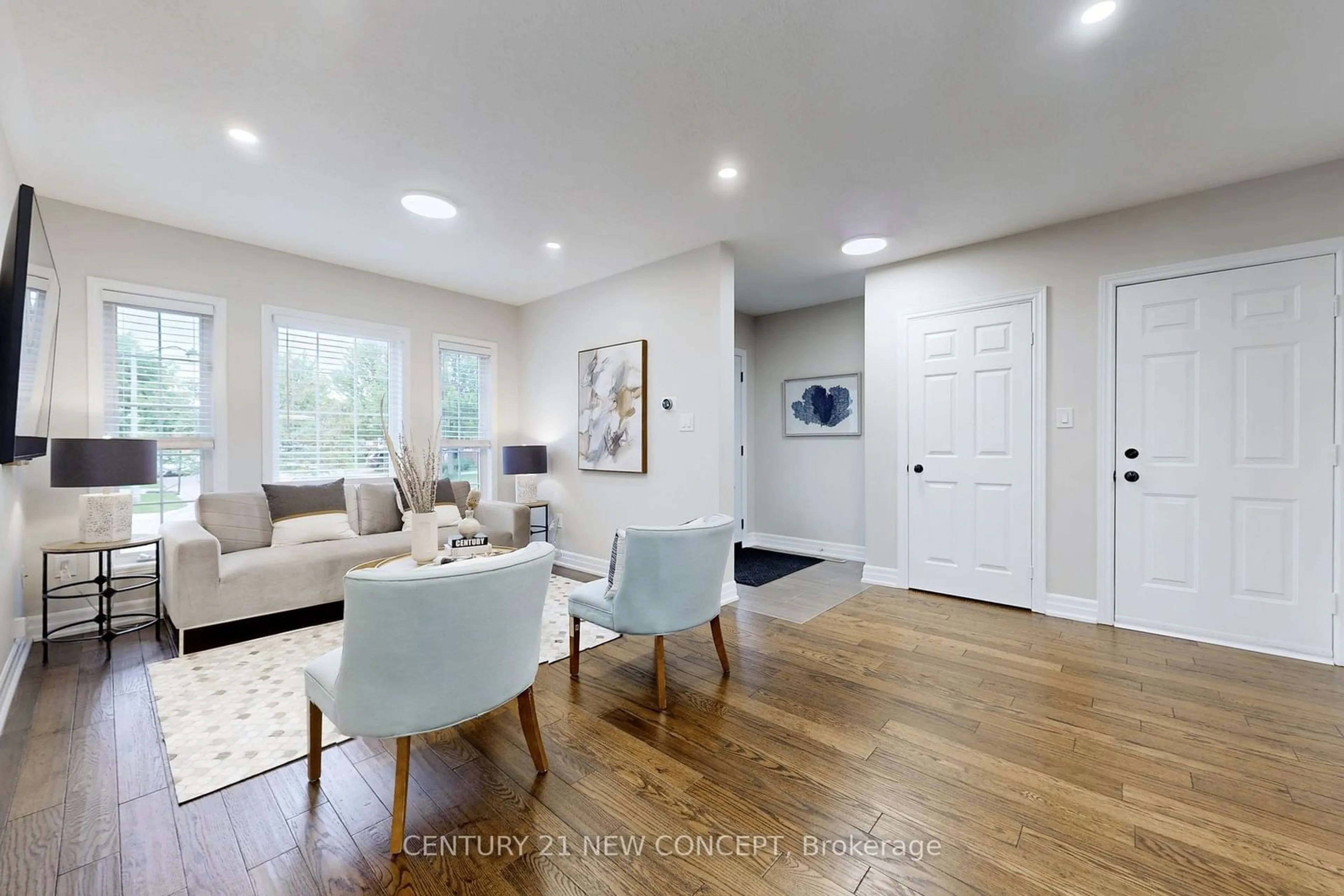 Living room with furniture, wood/laminate floor for 2144 Golden Orchard Tr, Oakville Ontario L6M 3W8