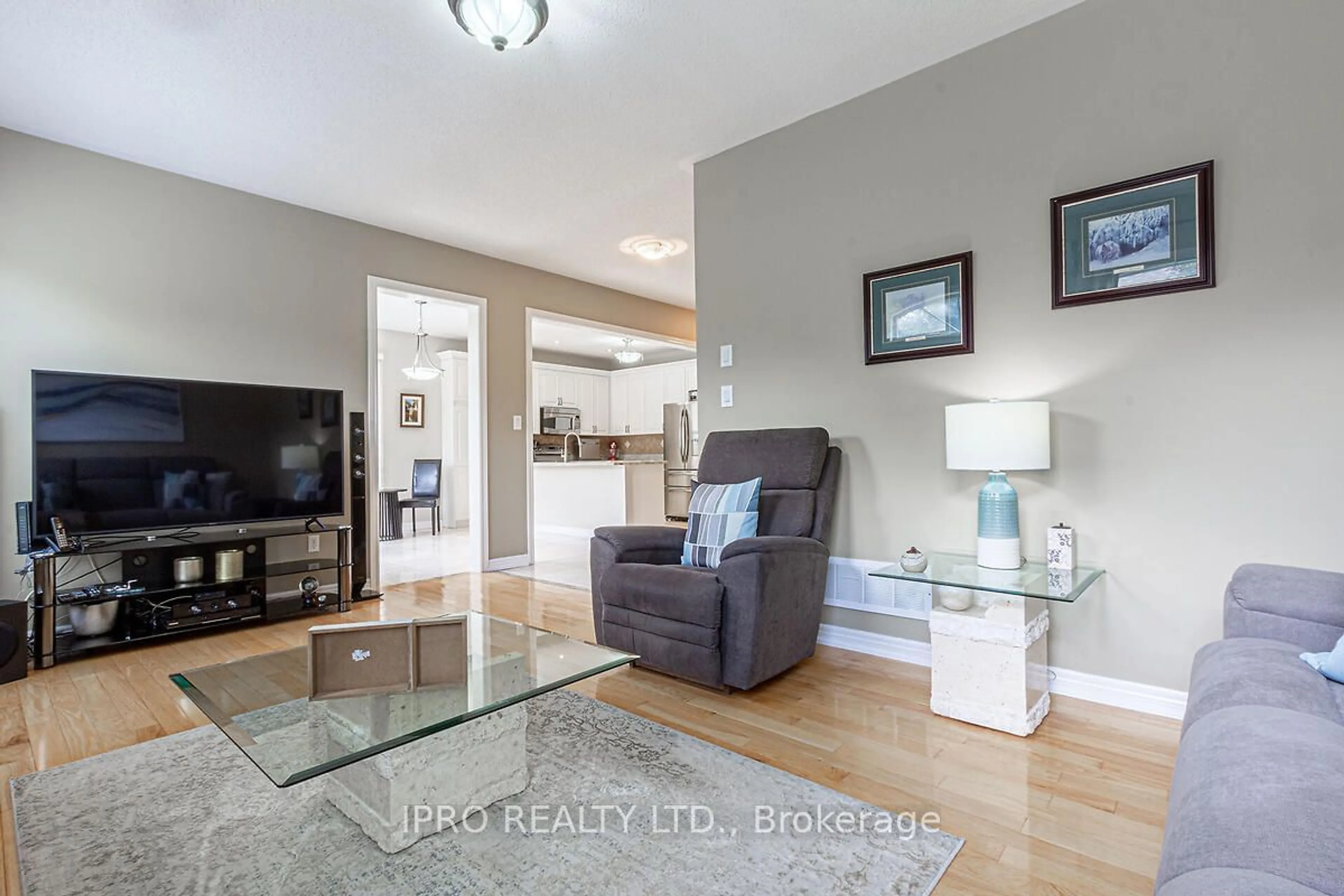 Living room with furniture, wood/laminate floor for 1376 Kingsgrove Pl, Oakville Ontario L6M 3V9