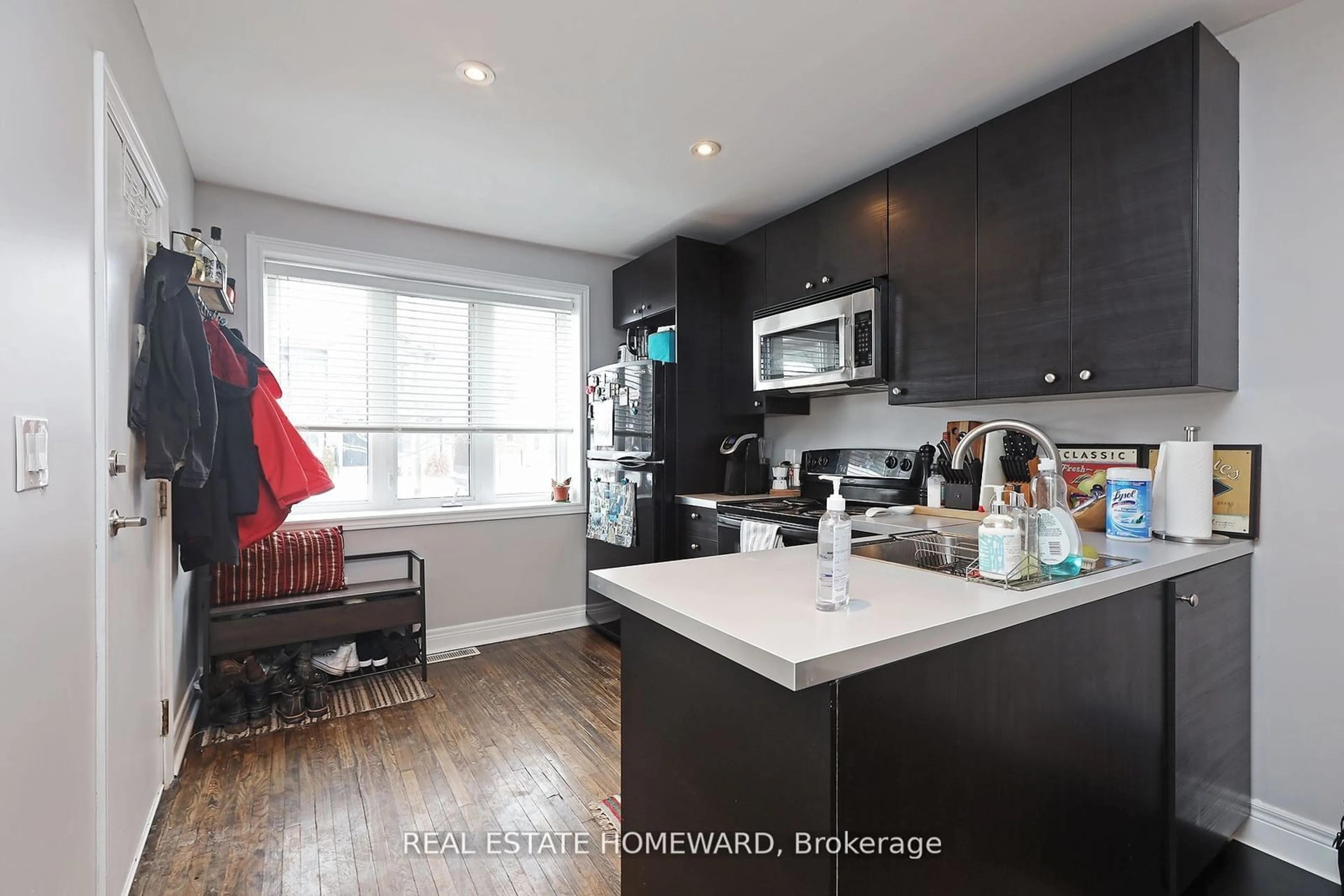 Open concept kitchen, wood/laminate floor for 156 Royal York Rd, Toronto Ontario M8V 2V3