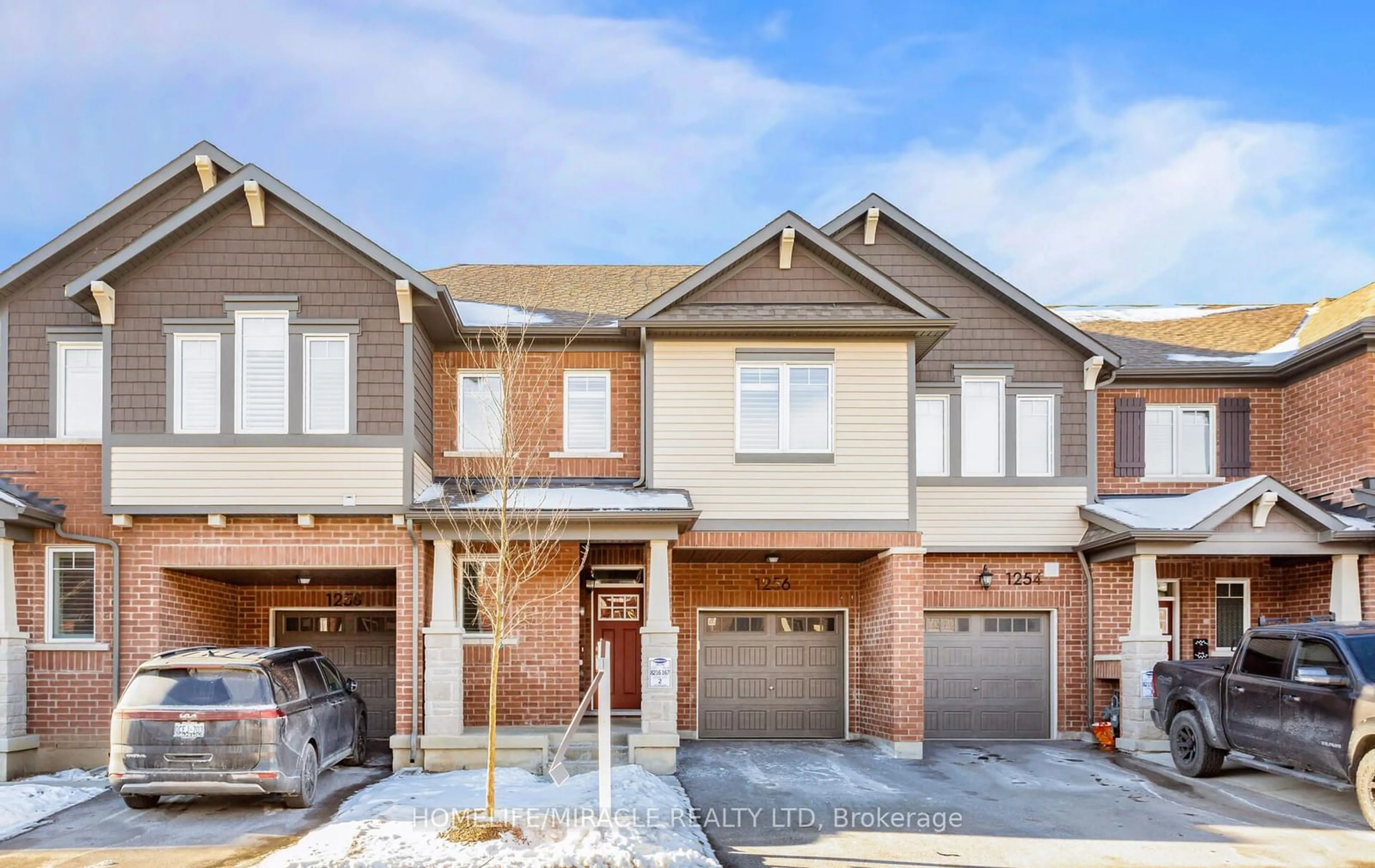 Home with brick exterior material, street for 1256 Redbud Gardens, Milton Ontario L9E 1S2