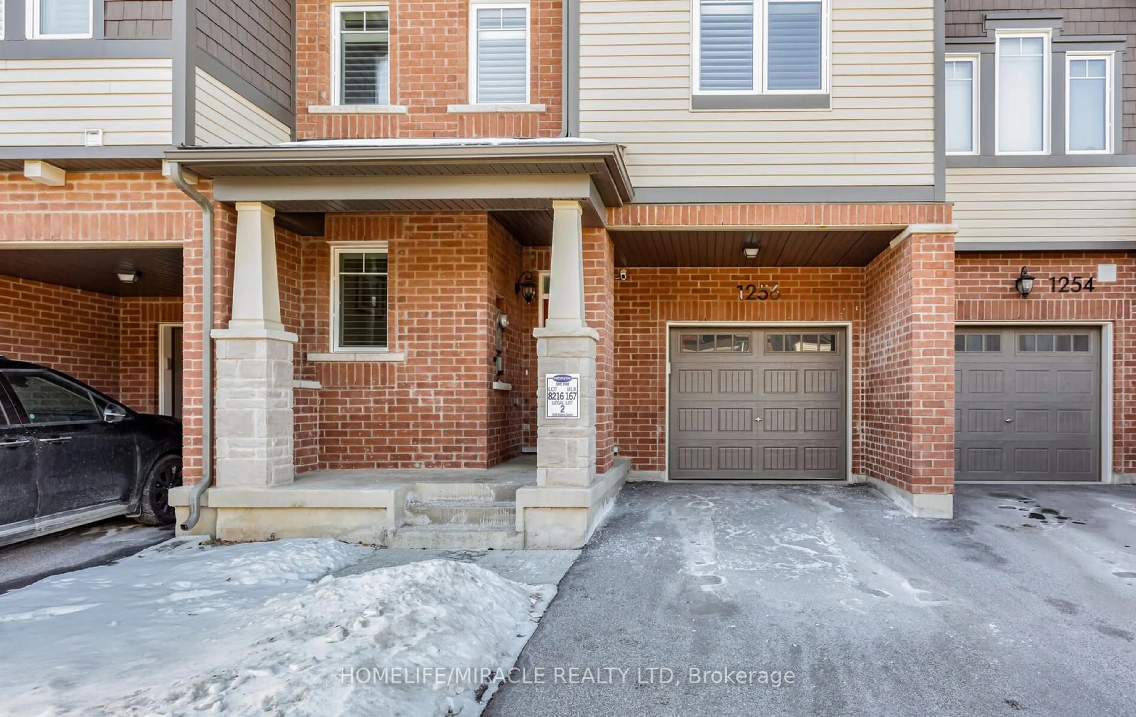 Home with brick exterior material, street for 1256 Redbud Gardens, Milton Ontario L9E 1S2