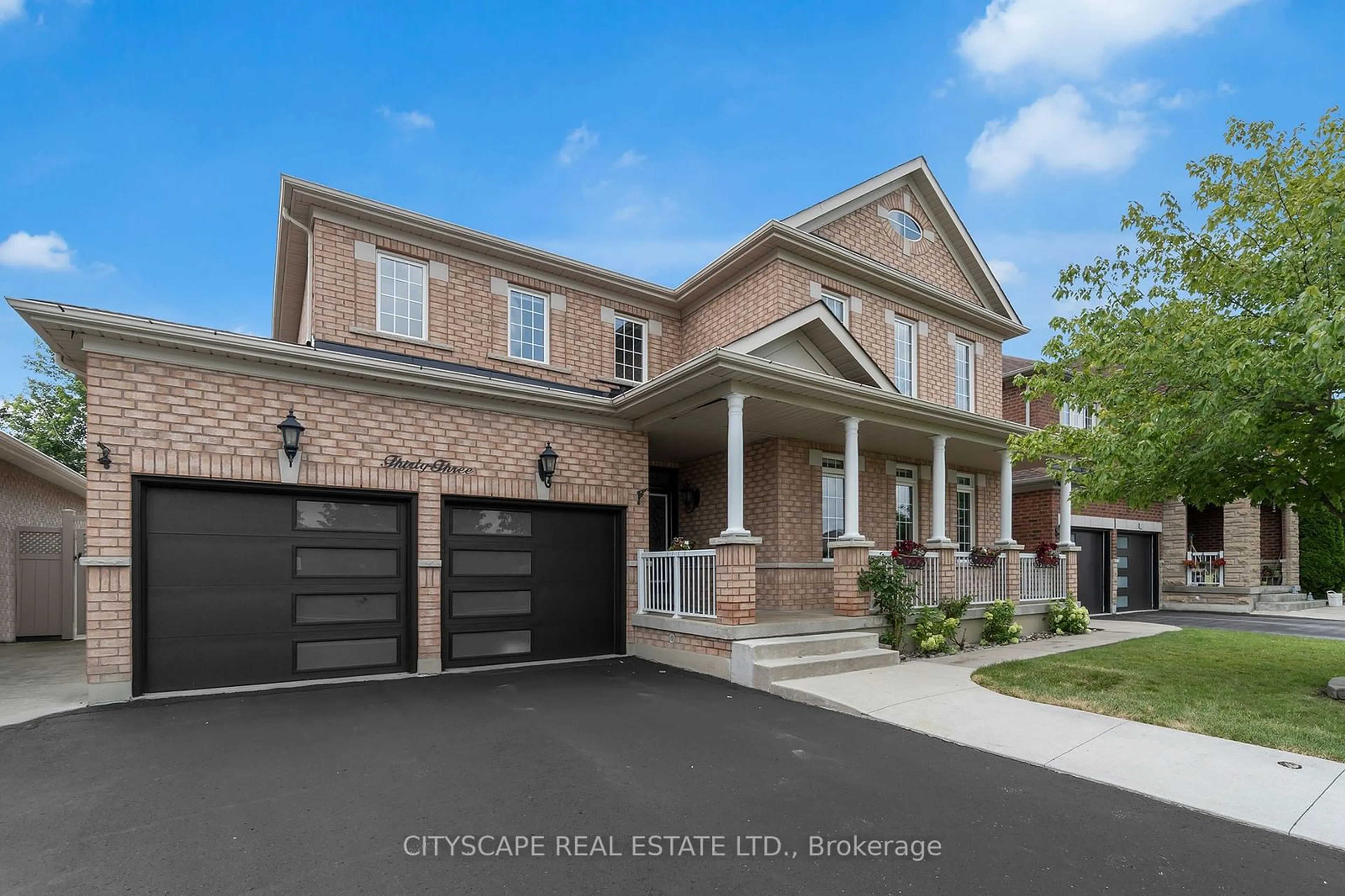 Home with brick exterior material, street for 33 Huntspoint Dr, Brampton Ontario L6P 2E9