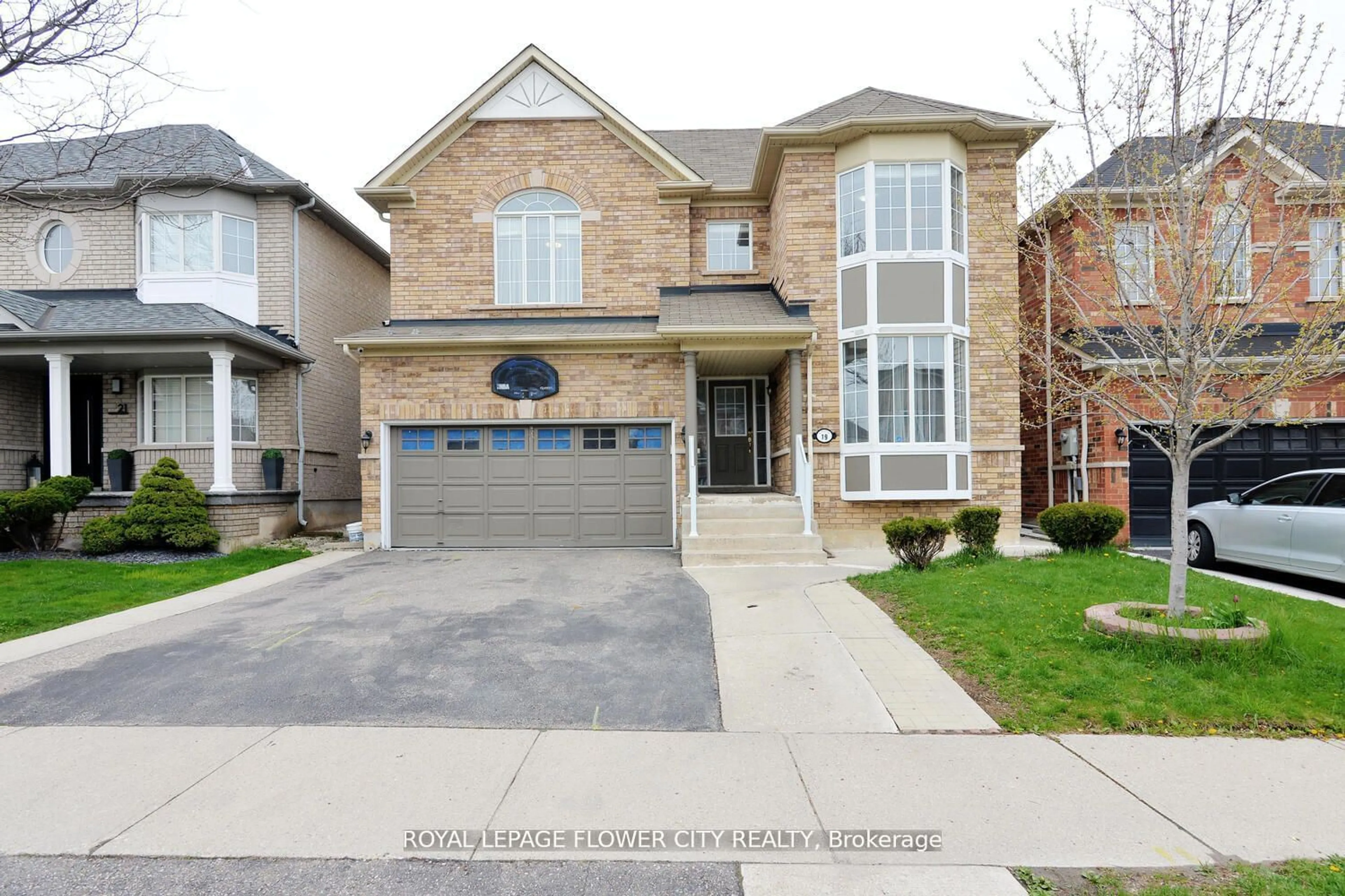 Home with brick exterior material, street for 19 Flatbush Lane, Brampton Ontario L7A 2R6