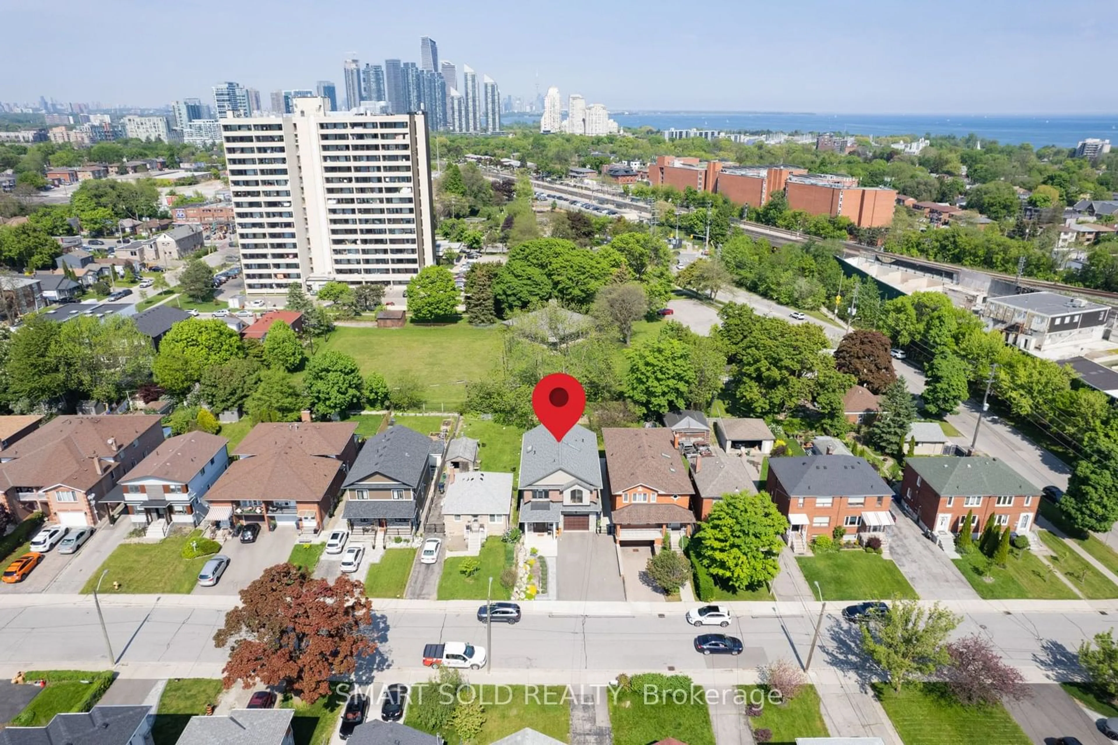 A pic from outside/outdoor area/front of a property/back of a property/a pic from drone, city buildings view from balcony for 21 Harold St, Toronto Ontario M8Z 3R4