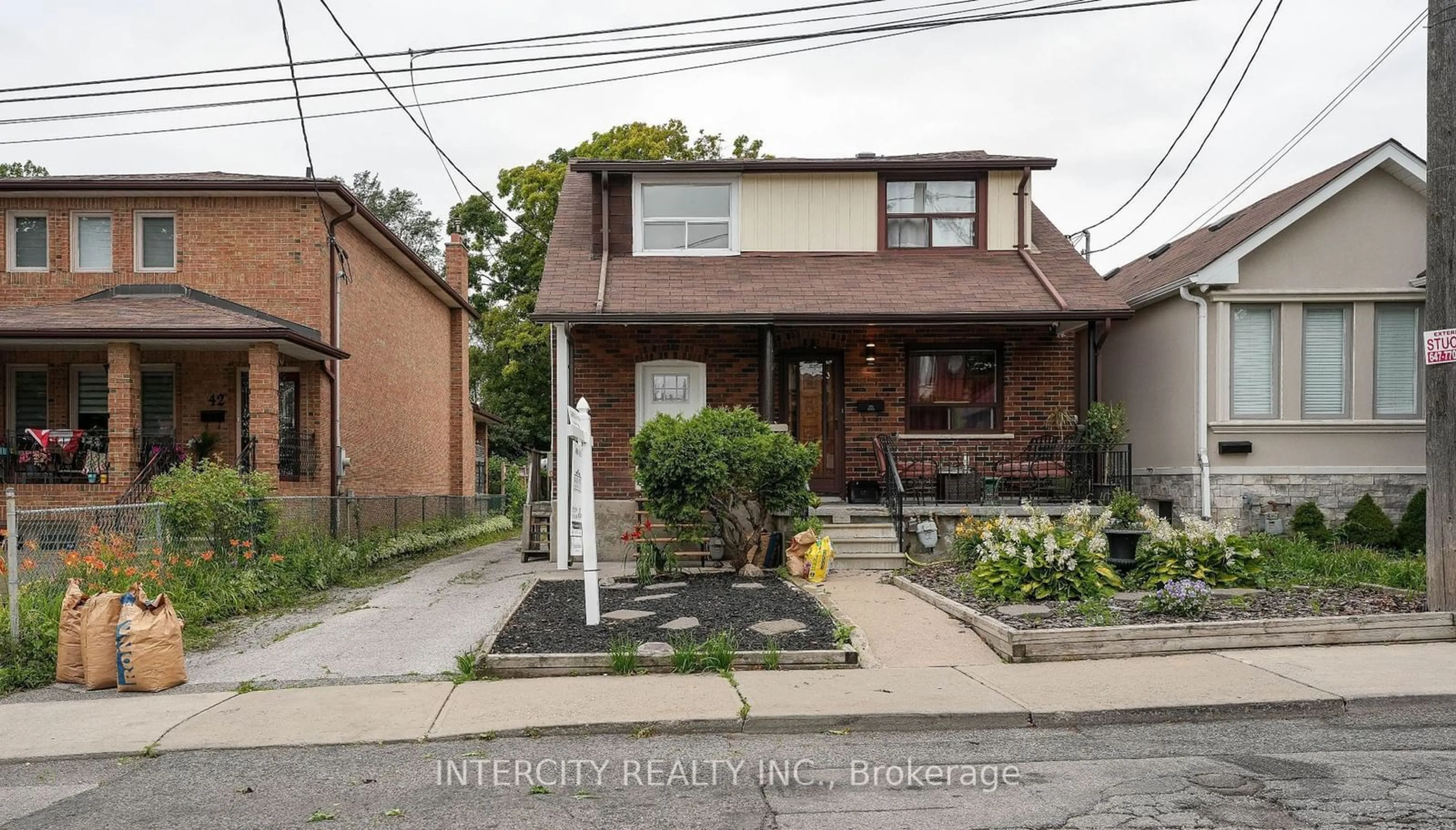 Home with brick exterior material, street for 44 Branstone Rd, Toronto Ontario M6E 4E4