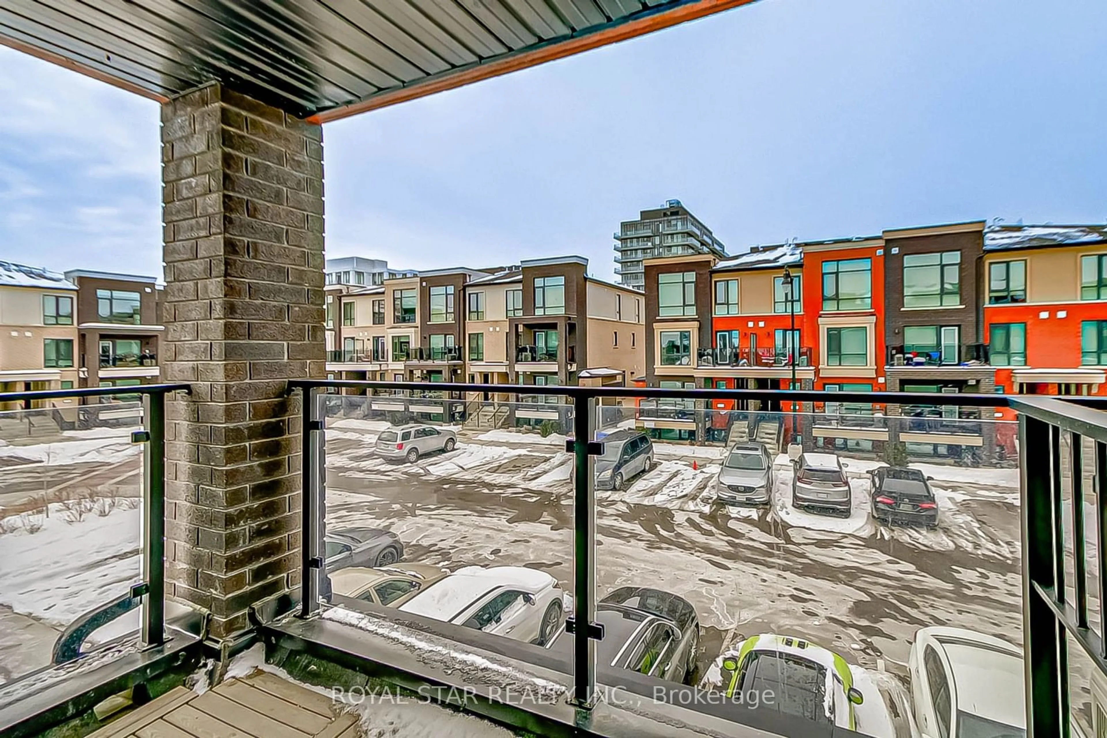 Patio, city buildings view from balcony for 155 Veterans Dr #3, Brampton Ontario L7A 5L2