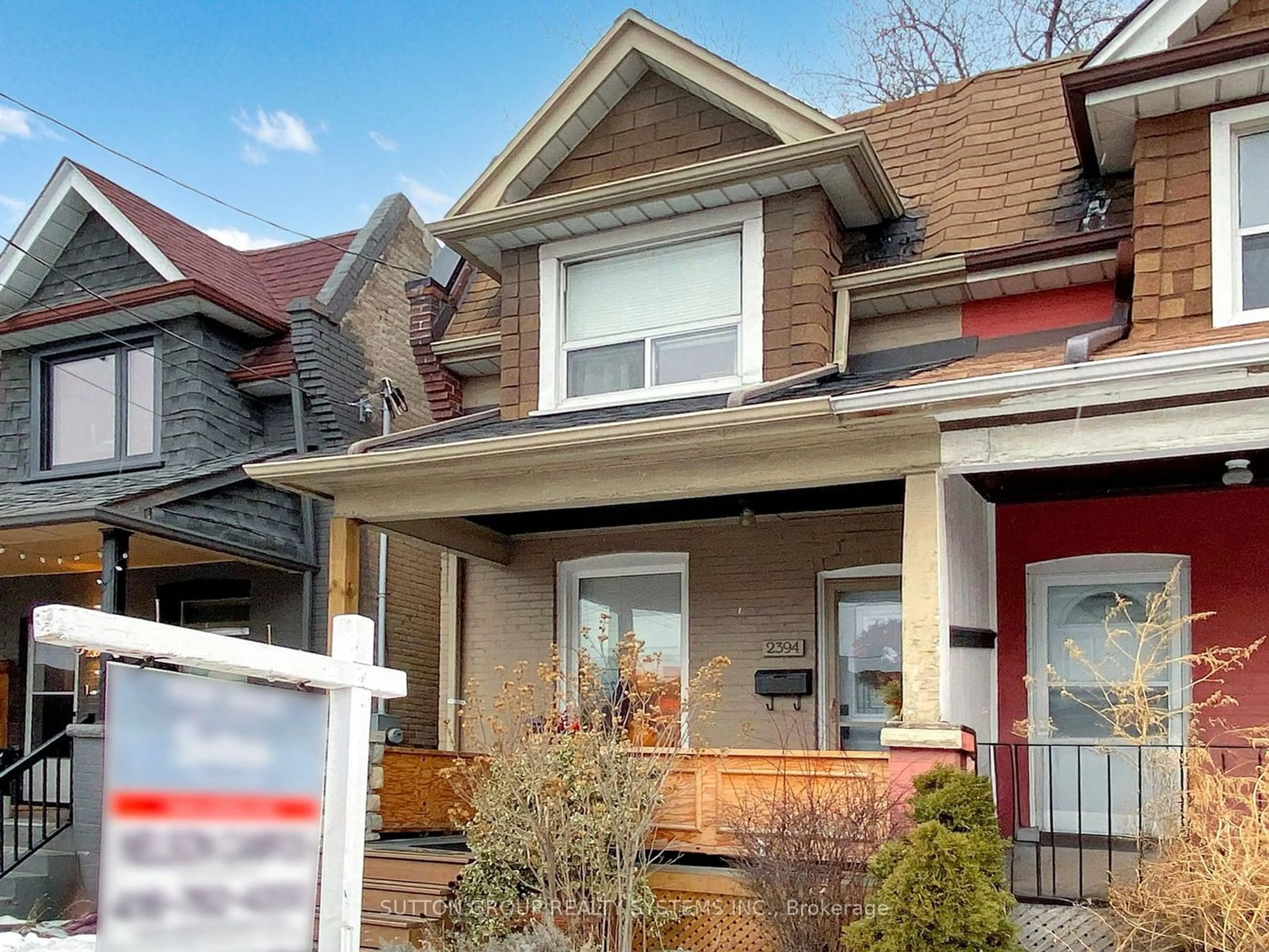 Home with brick exterior material, street for 2394 St Clair Ave, Toronto Ontario M6N 1L1