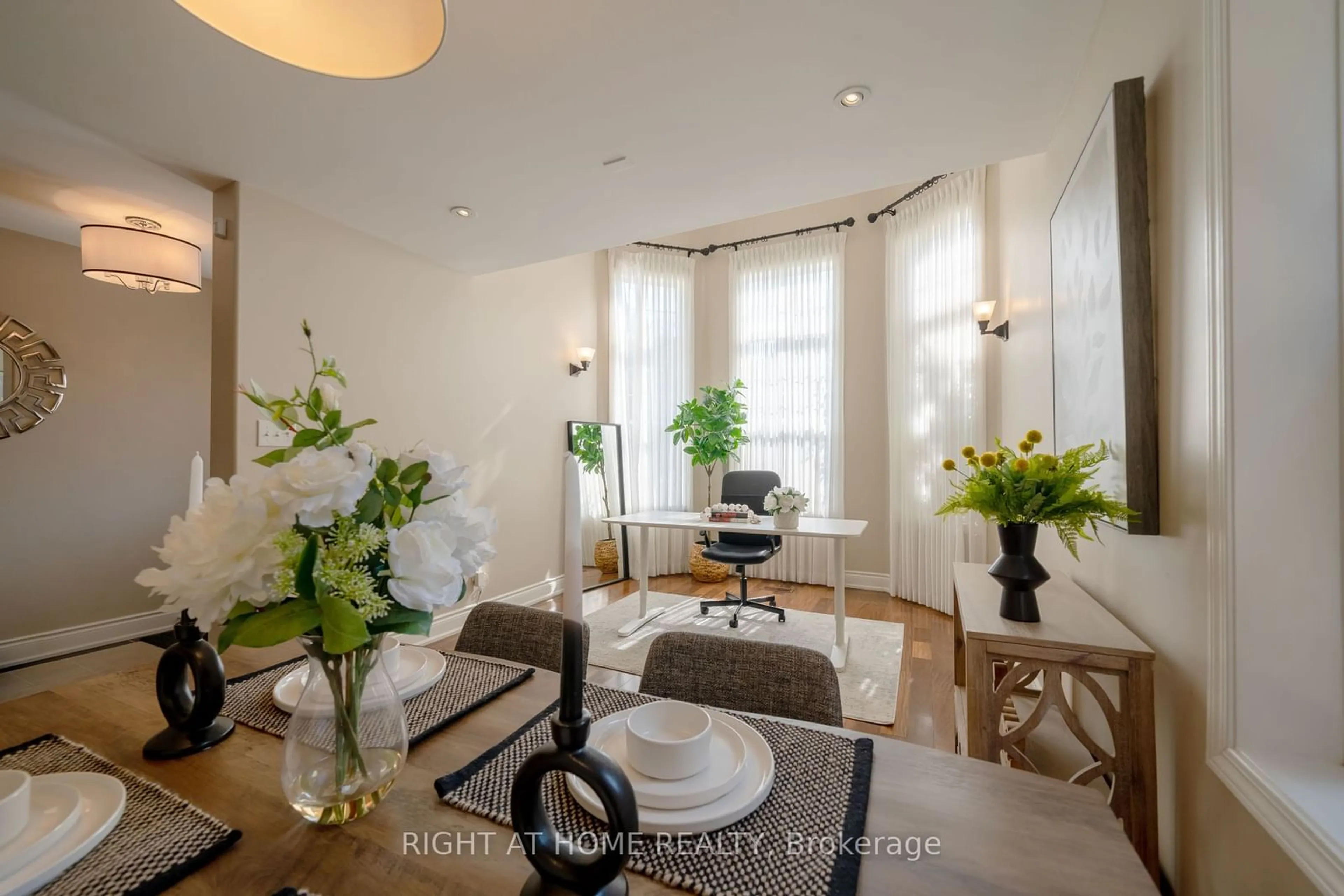 Living room with furniture, wood/laminate floor for 3129 Abernathy Way, Oakville Ontario L6M 5C2