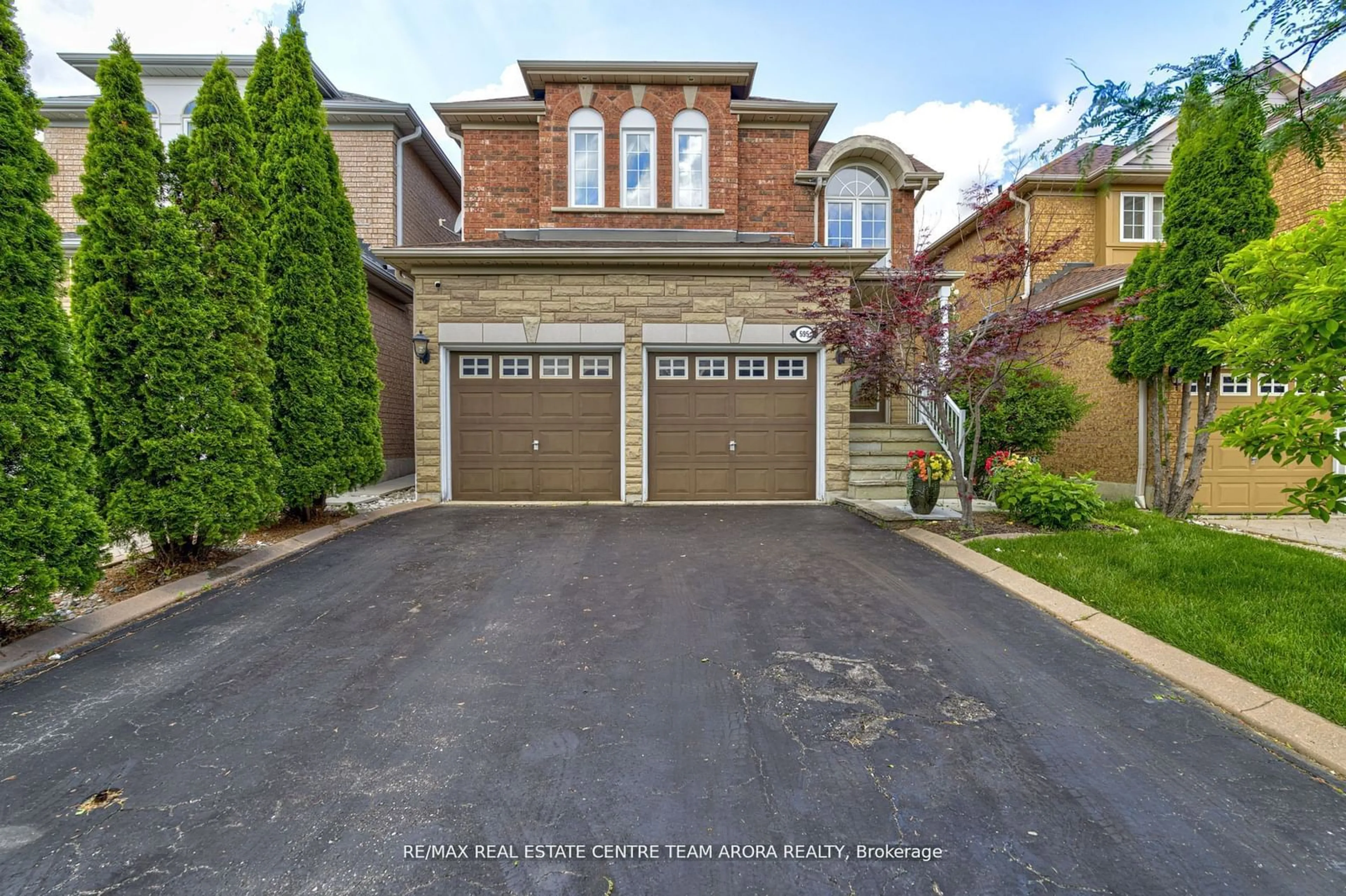 Home with brick exterior material, street for 595 Warhol Way, Mississauga Ontario L5W 1M2