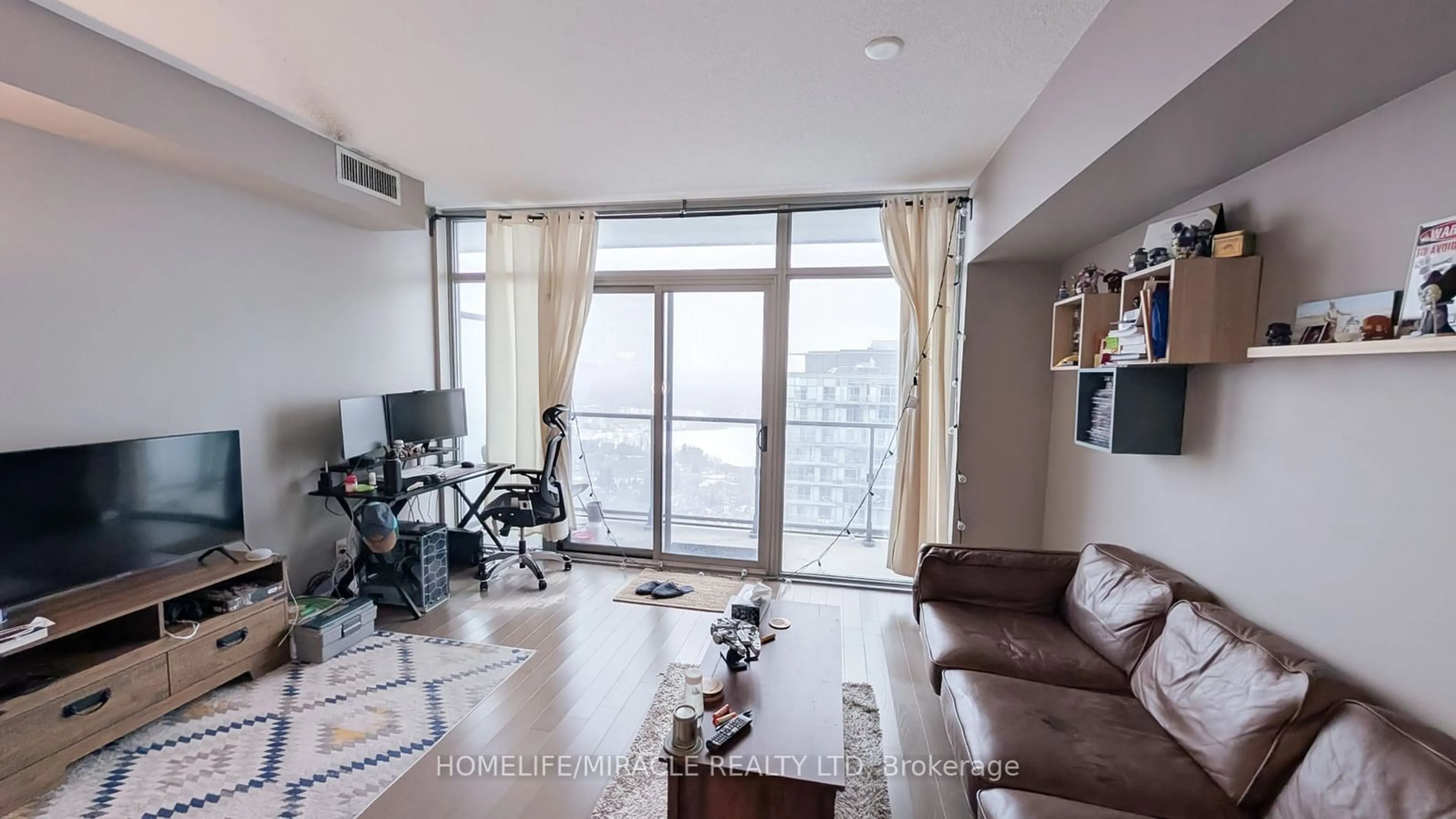 Living room with furniture, unknown for 105 The Queensway #3012, Toronto Ontario M6S 5B5