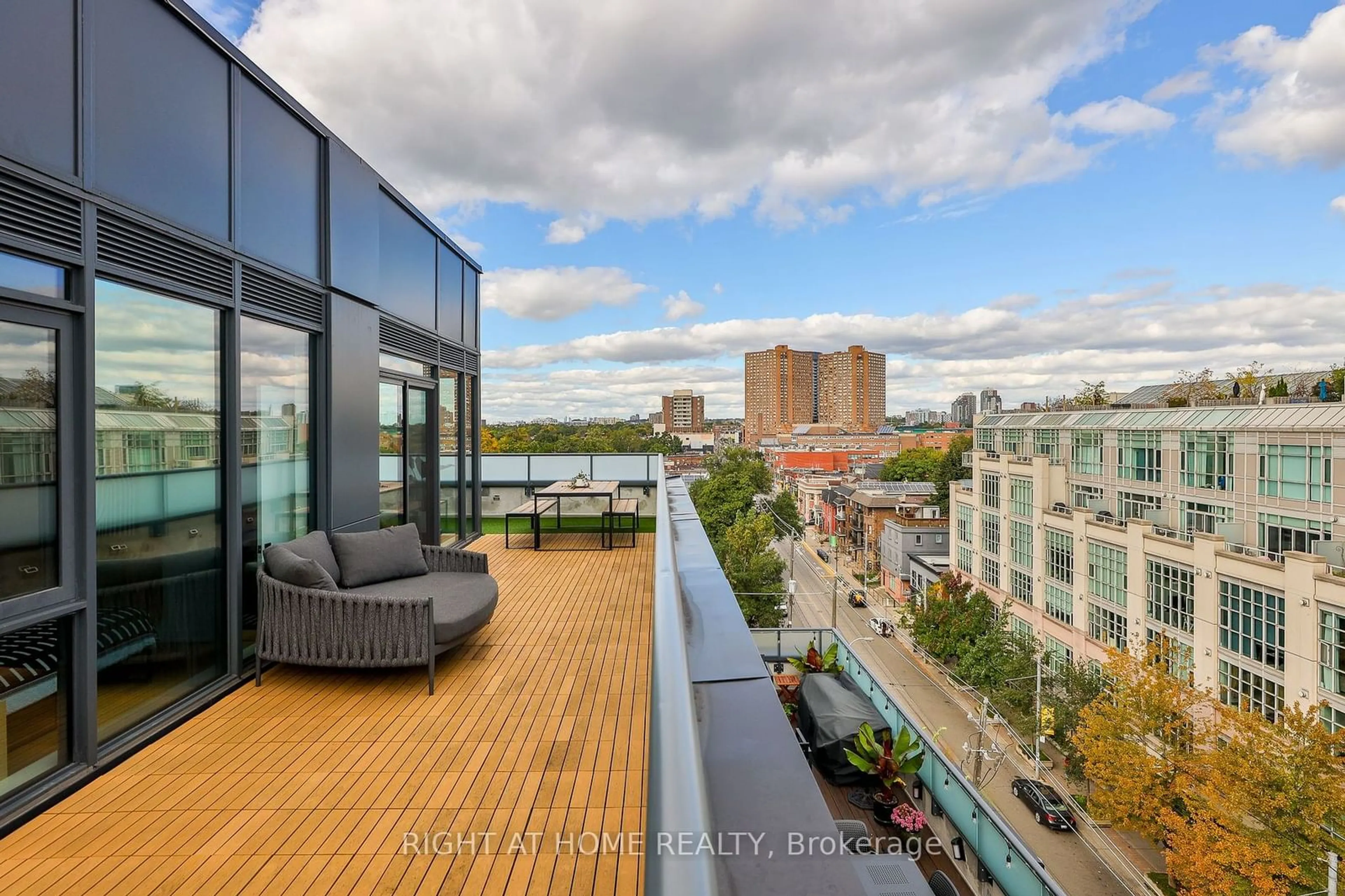 Patio, city buildings view from balcony for 430 Roncesvalles Ave #801, Toronto Ontario M6R 0A6