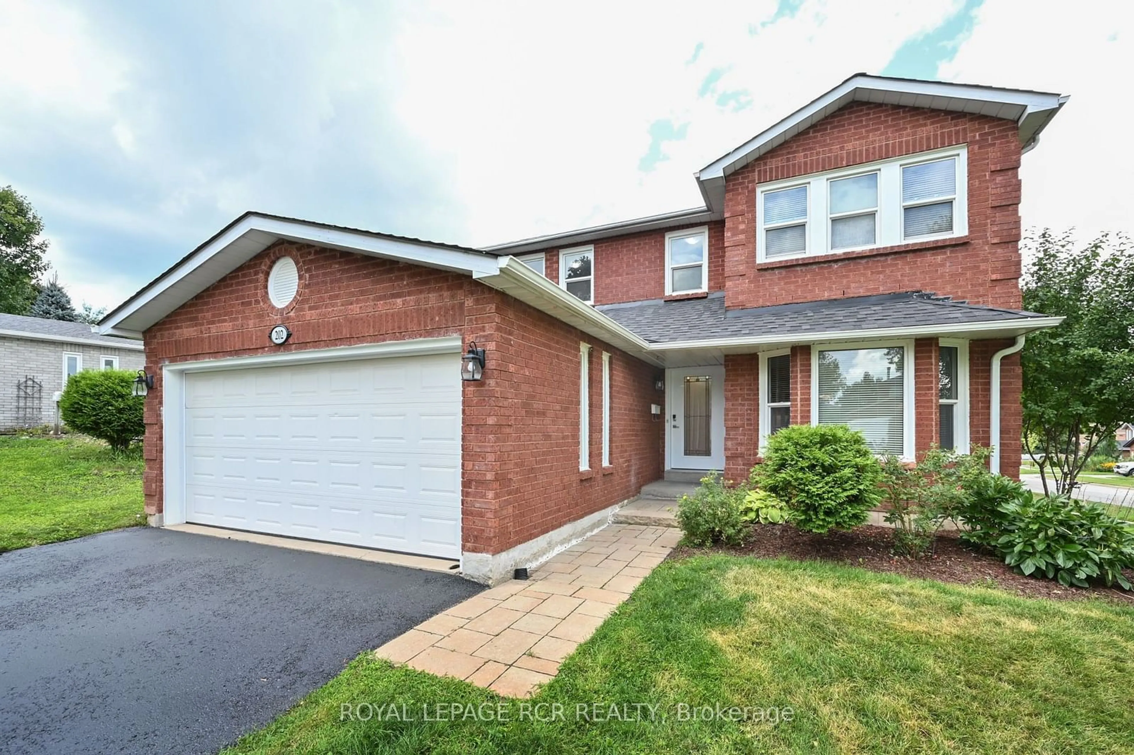 Home with brick exterior material, street for 202 Edenwood Cres, Orangeville Ontario L9W 4M9