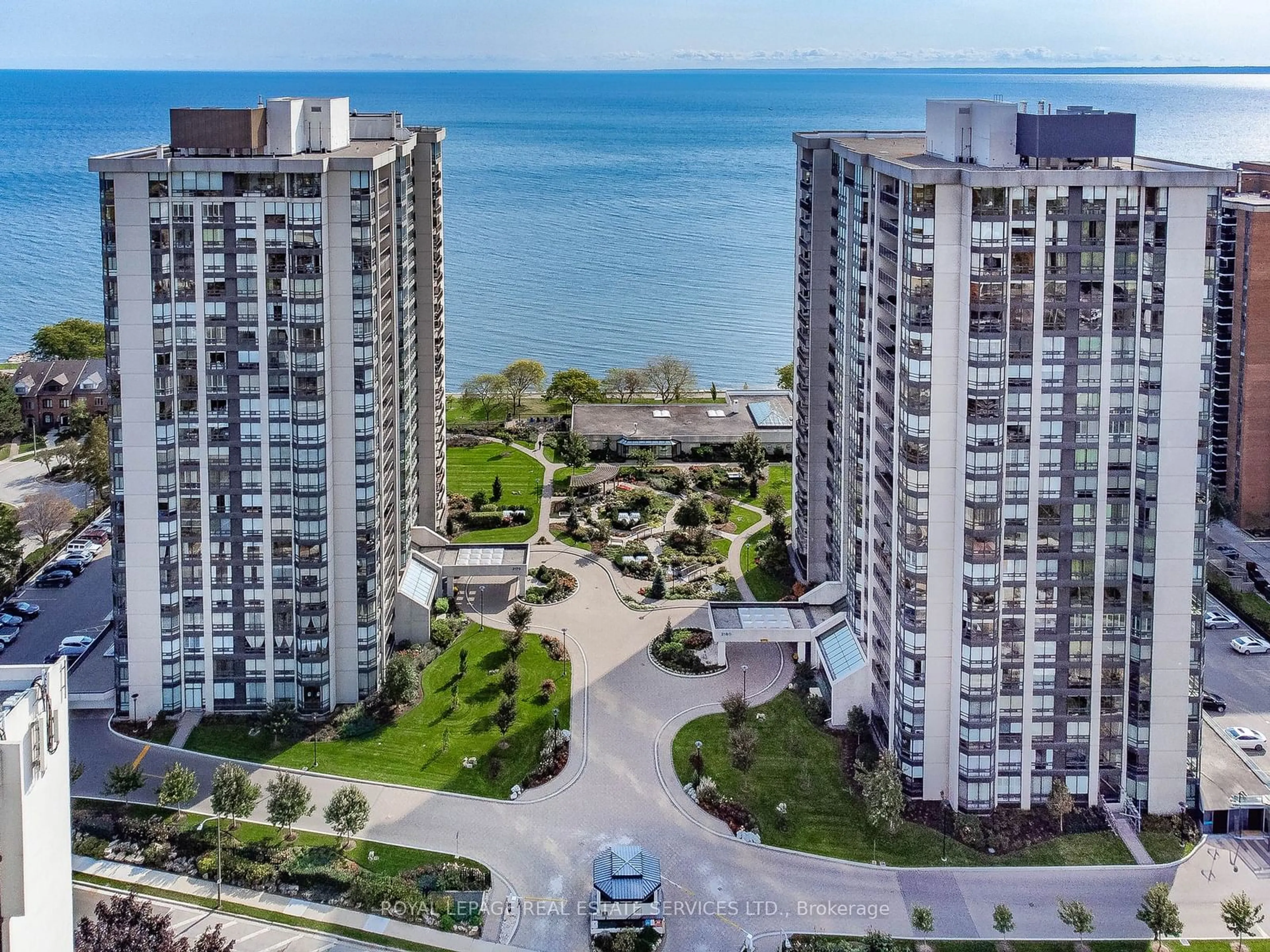 A pic from outside/outdoor area/front of a property/back of a property/a pic from drone, water/lake/river/ocean view for 2180 Marine Dr #1008, Oakville Ontario L6L 5V2