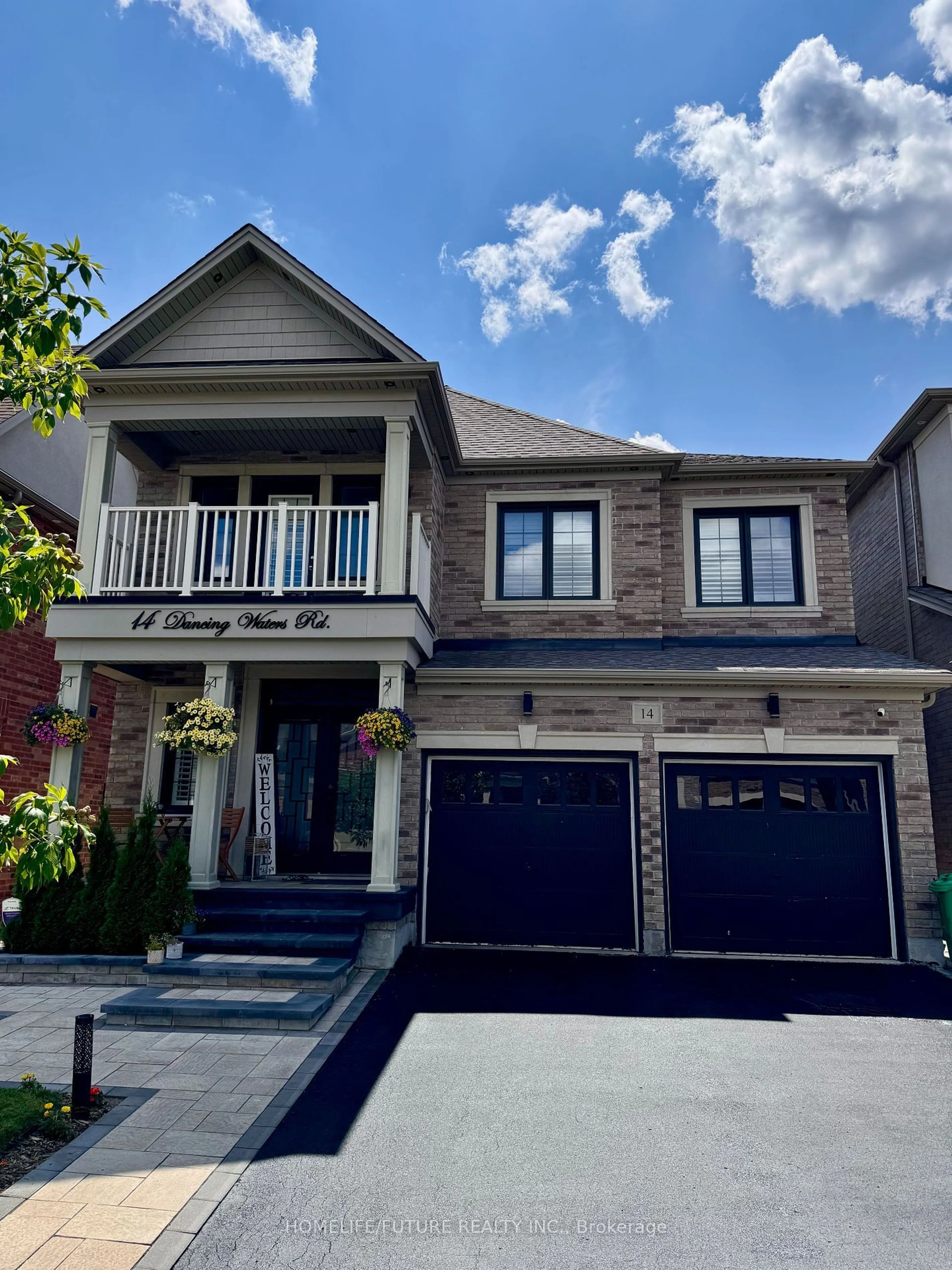 Home with brick exterior material, street for 14 Dancing Waters Rd, Brampton Ontario L6Y 6B5