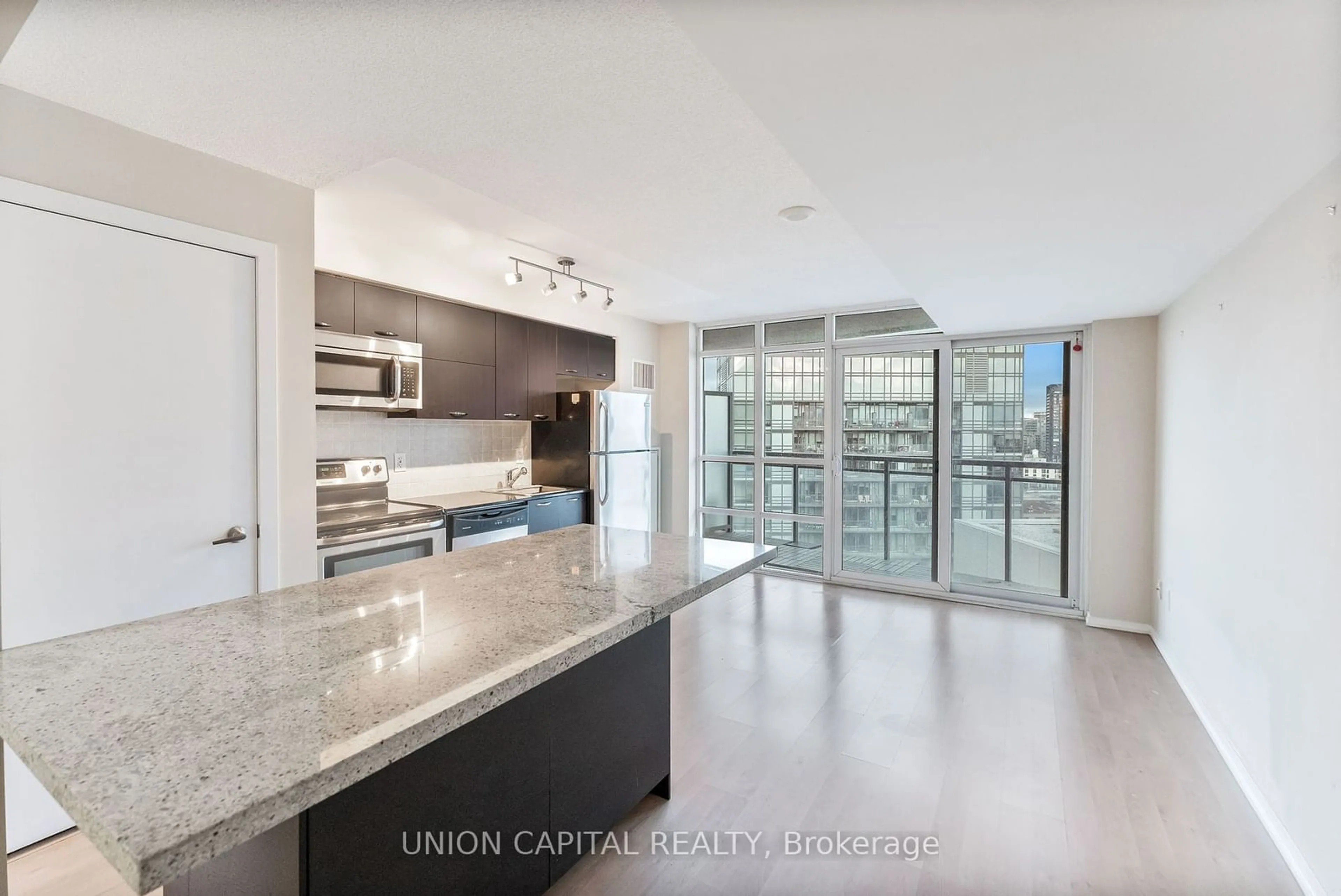 Open concept kitchen, unknown for 38 Joe Shuster Way #1801, Toronto Ontario M6K 0A5