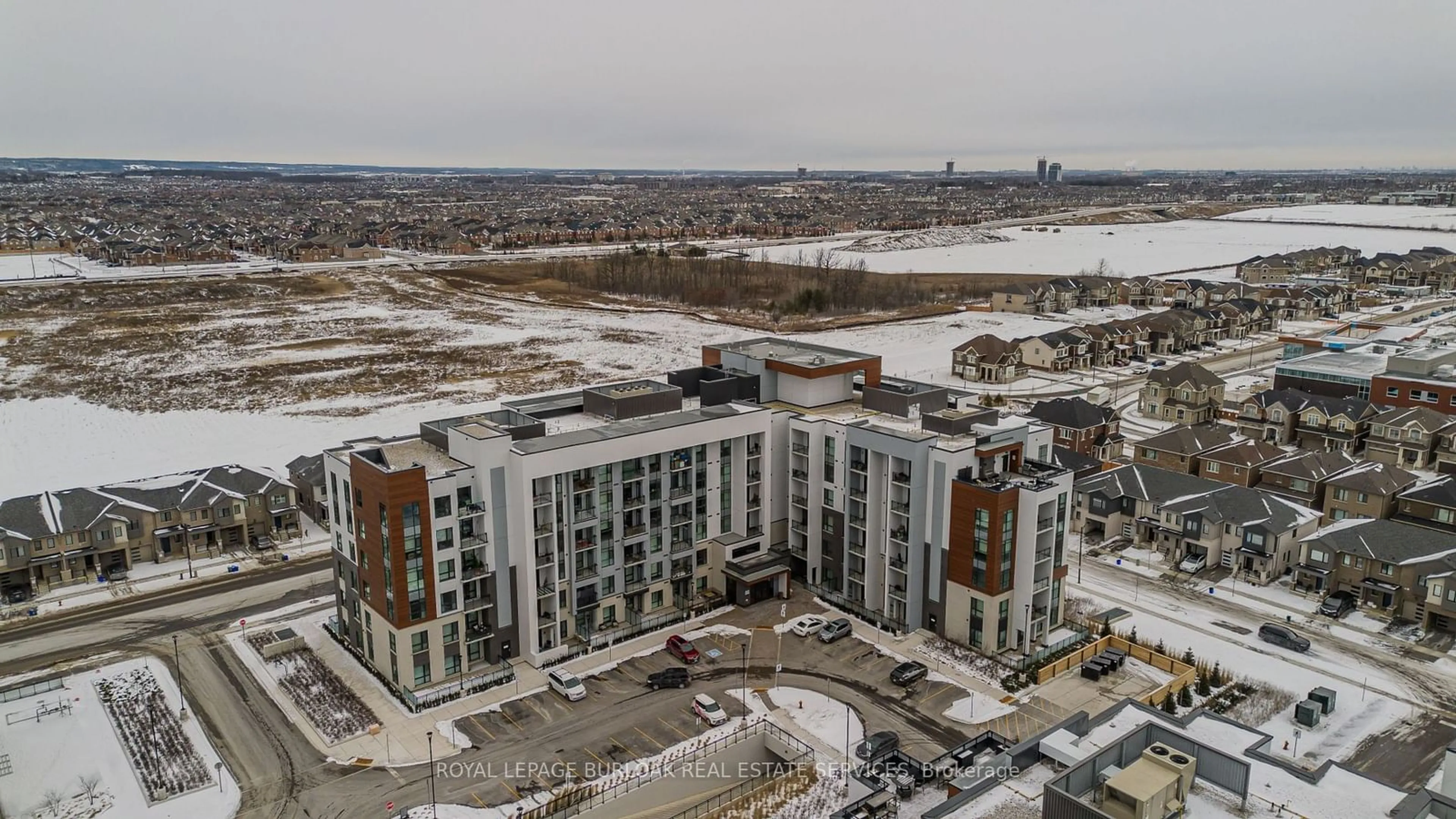 A pic from outside/outdoor area/front of a property/back of a property/a pic from drone, city buildings view from balcony for 460 Gordon Krantz Ave #512, Milton Ontario L9E 1Z2