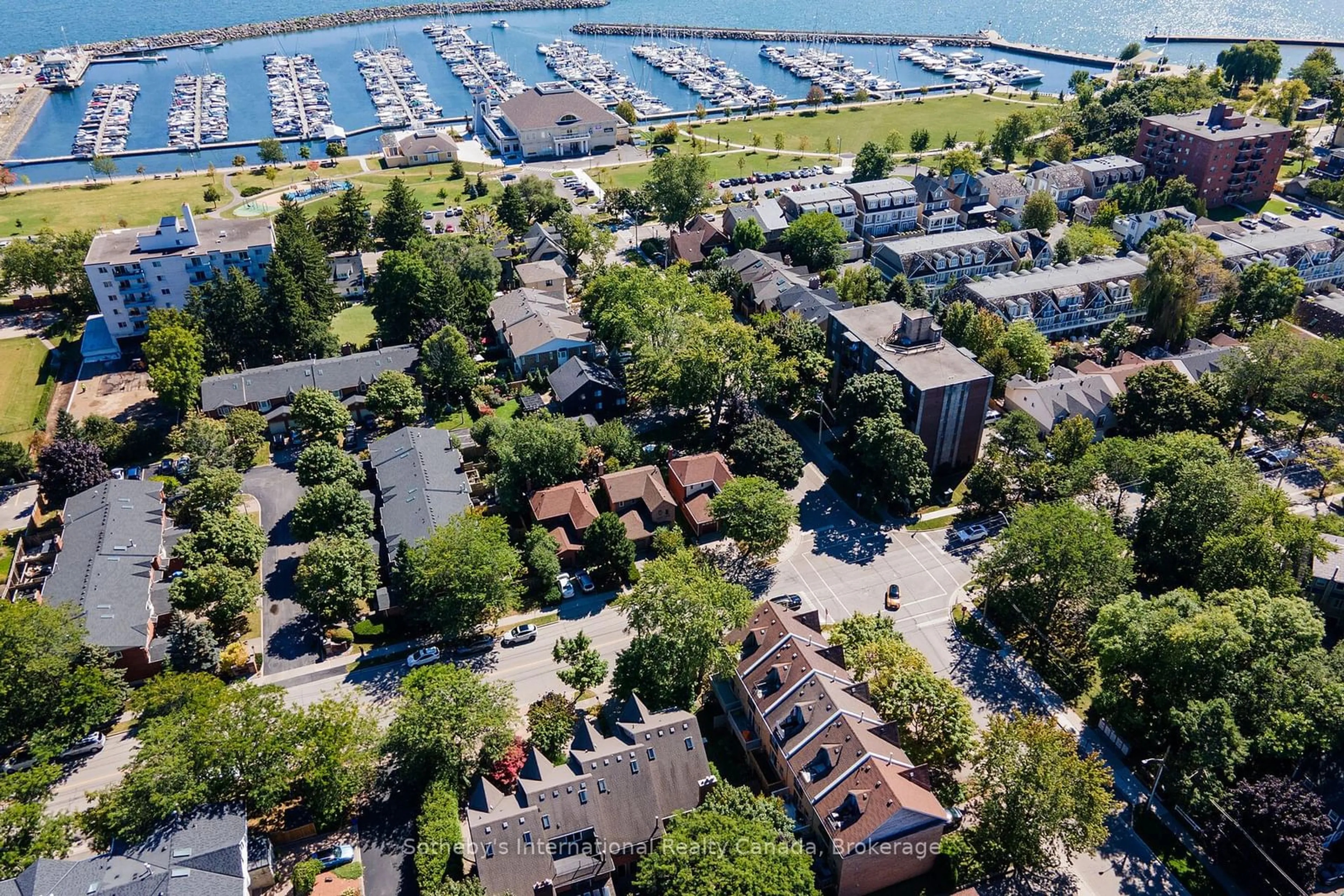 A pic from outside/outdoor area/front of a property/back of a property/a pic from drone, water/lake/river/ocean view for 2329 Marine Dr, Oakville Ontario L6L 1C2