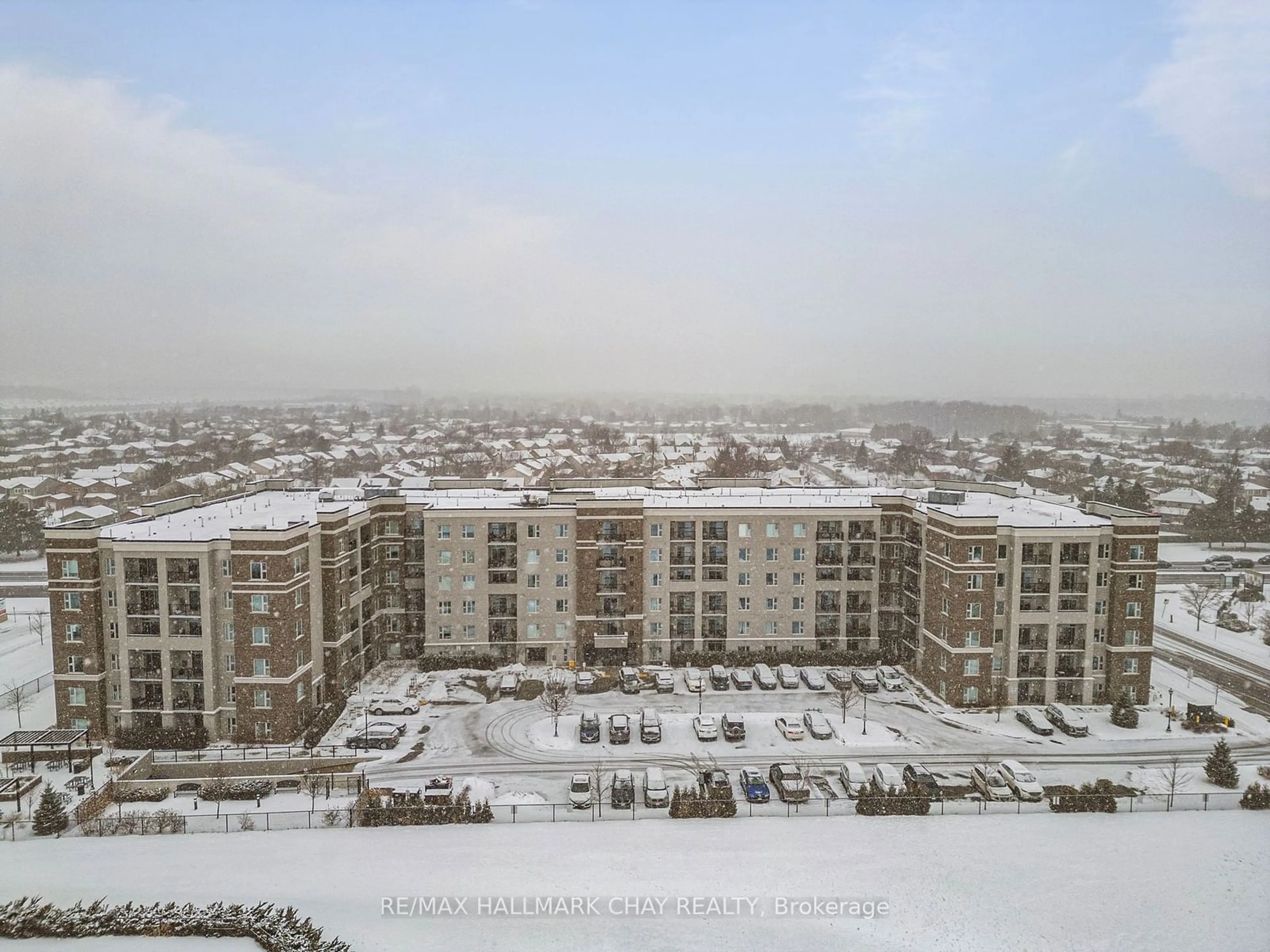 A pic from outside/outdoor area/front of a property/back of a property/a pic from drone, city buildings view from balcony for 610 Farmstead Dr #622, Milton Ontario L9T 8X5