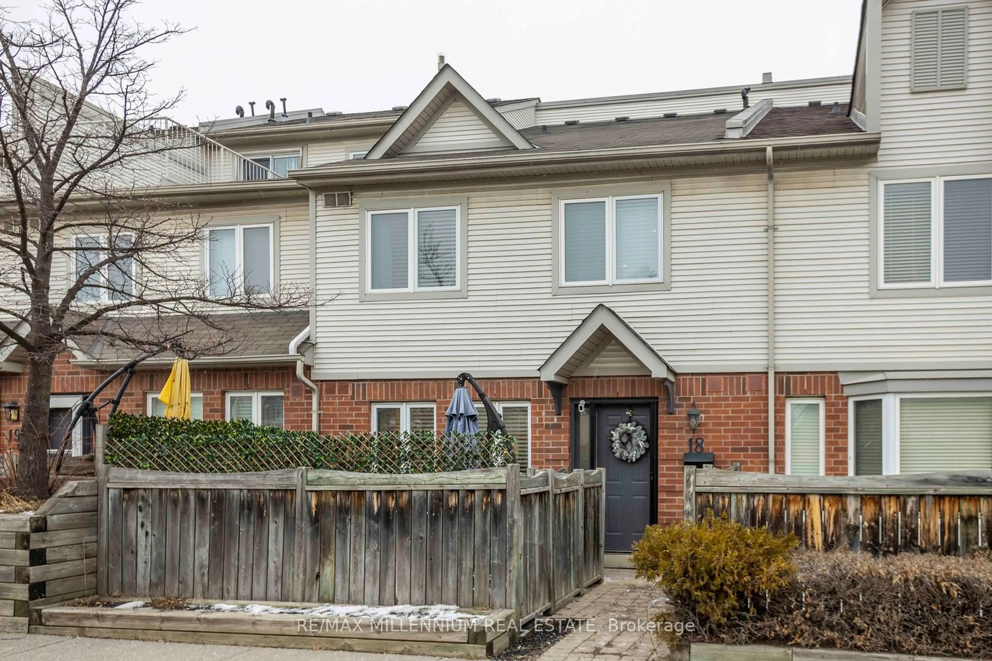 Home with brick exterior material, street for 1221 Parkwest Pl #18, Mississauga Ontario L5E 3J3