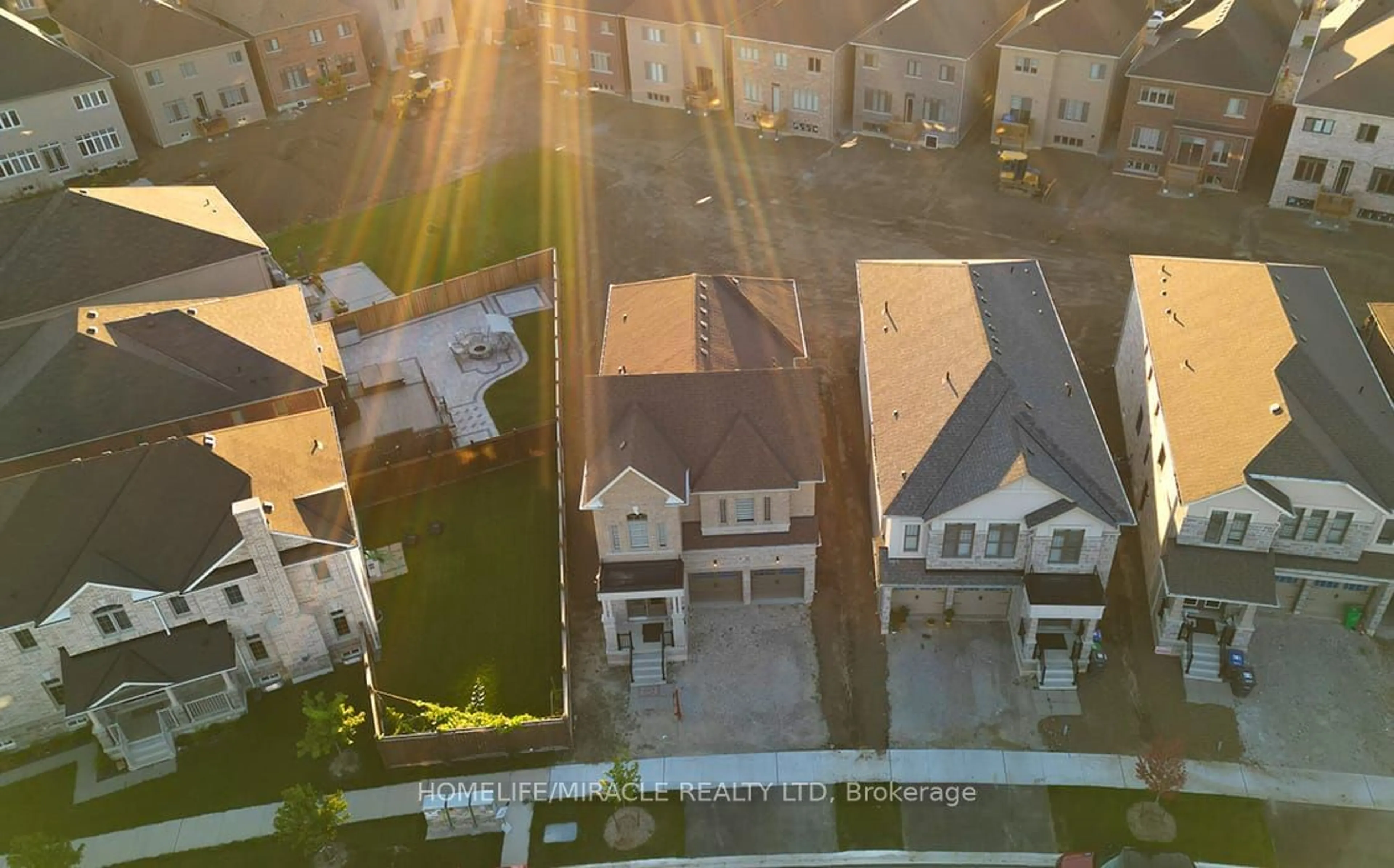 A pic from outside/outdoor area/front of a property/back of a property/a pic from drone, city buildings view from balcony for 32 Dotchson Ave, Caledon Ontario L7C 4G6