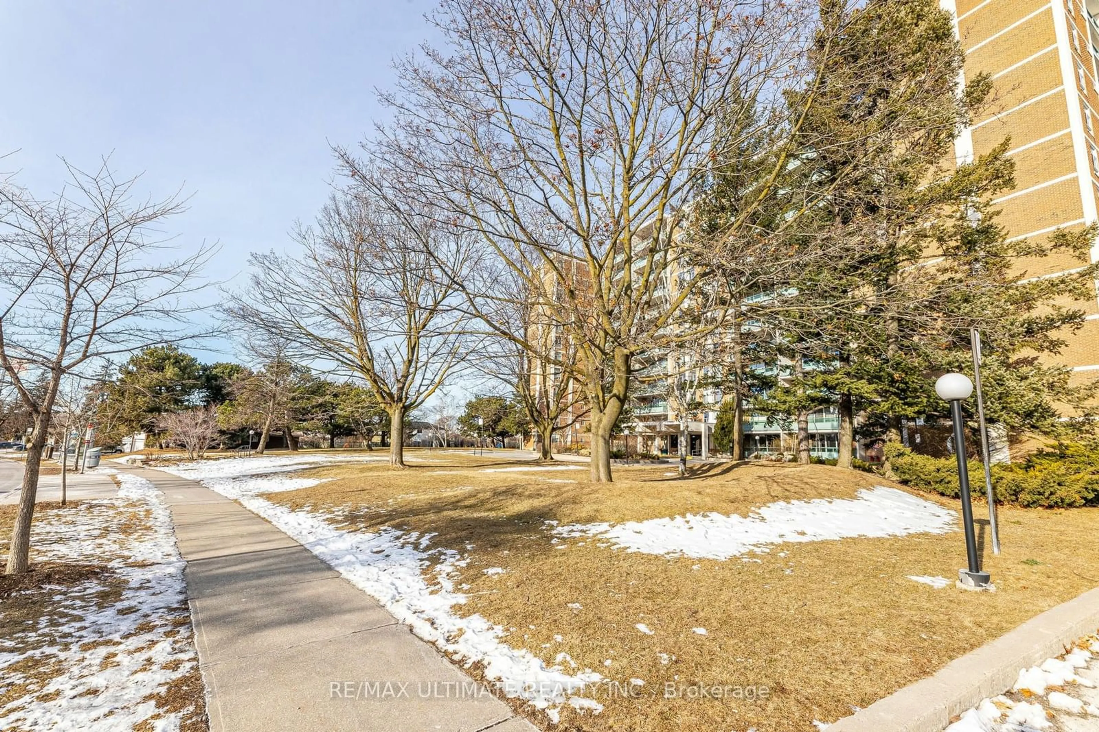 A pic from outside/outdoor area/front of a property/back of a property/a pic from drone, street for 44 Longbourne Dr #302, Toronto Ontario M9R 2M7