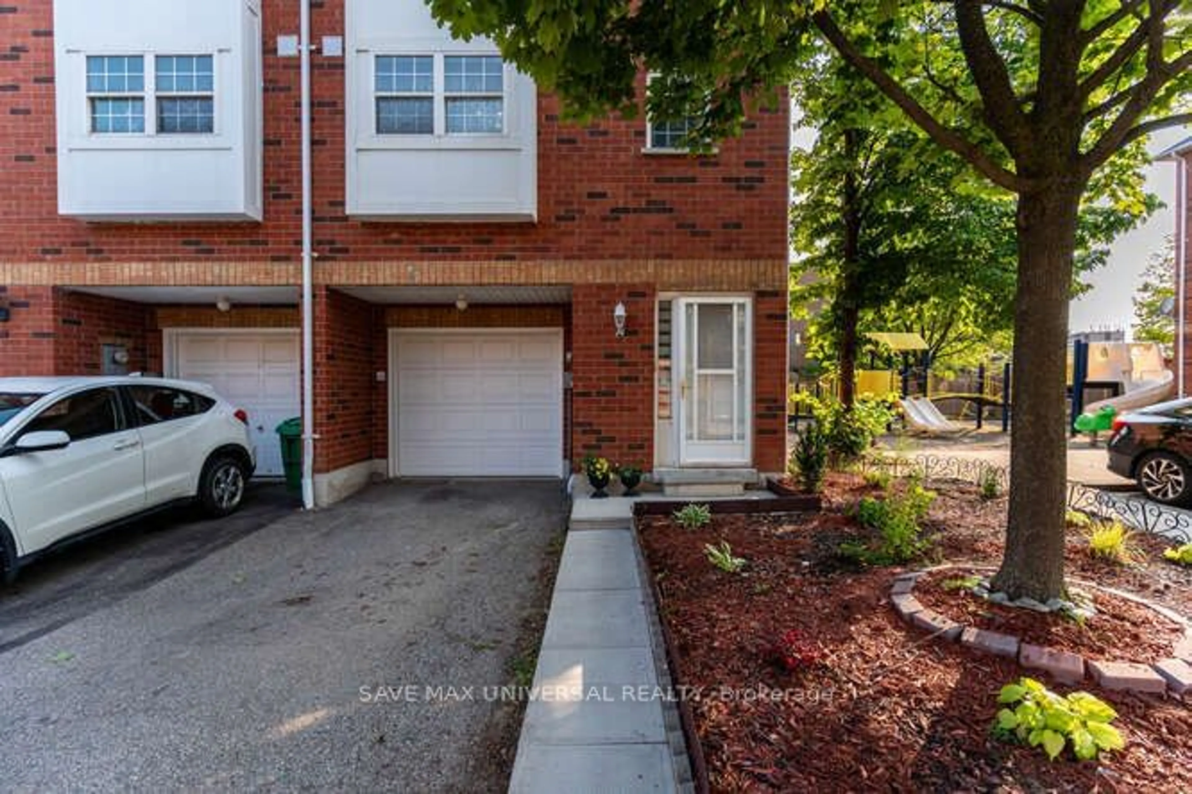 Home with brick exterior material, street for 6860 Meadowvale Town Cntr Circ #14, Mississauga Ontario L5N 7T4