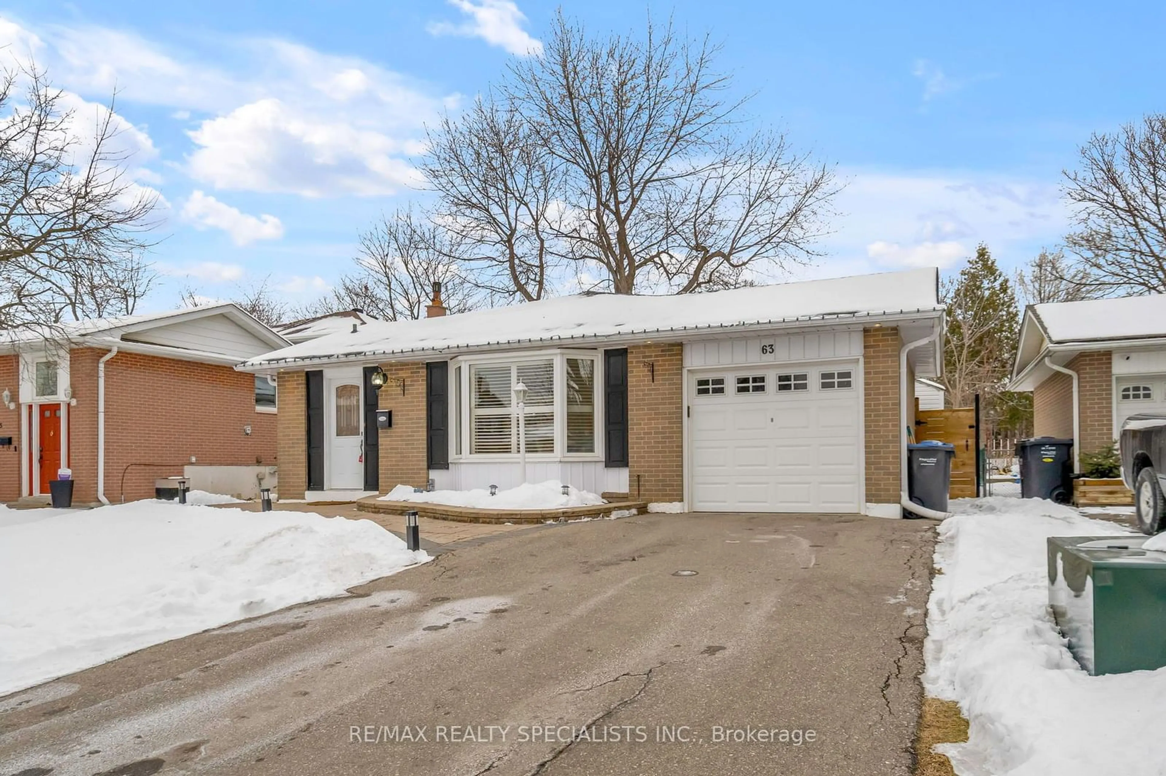 Home with brick exterior material, street for 63 Lockton Cres, Brampton Ontario L6W 1C2