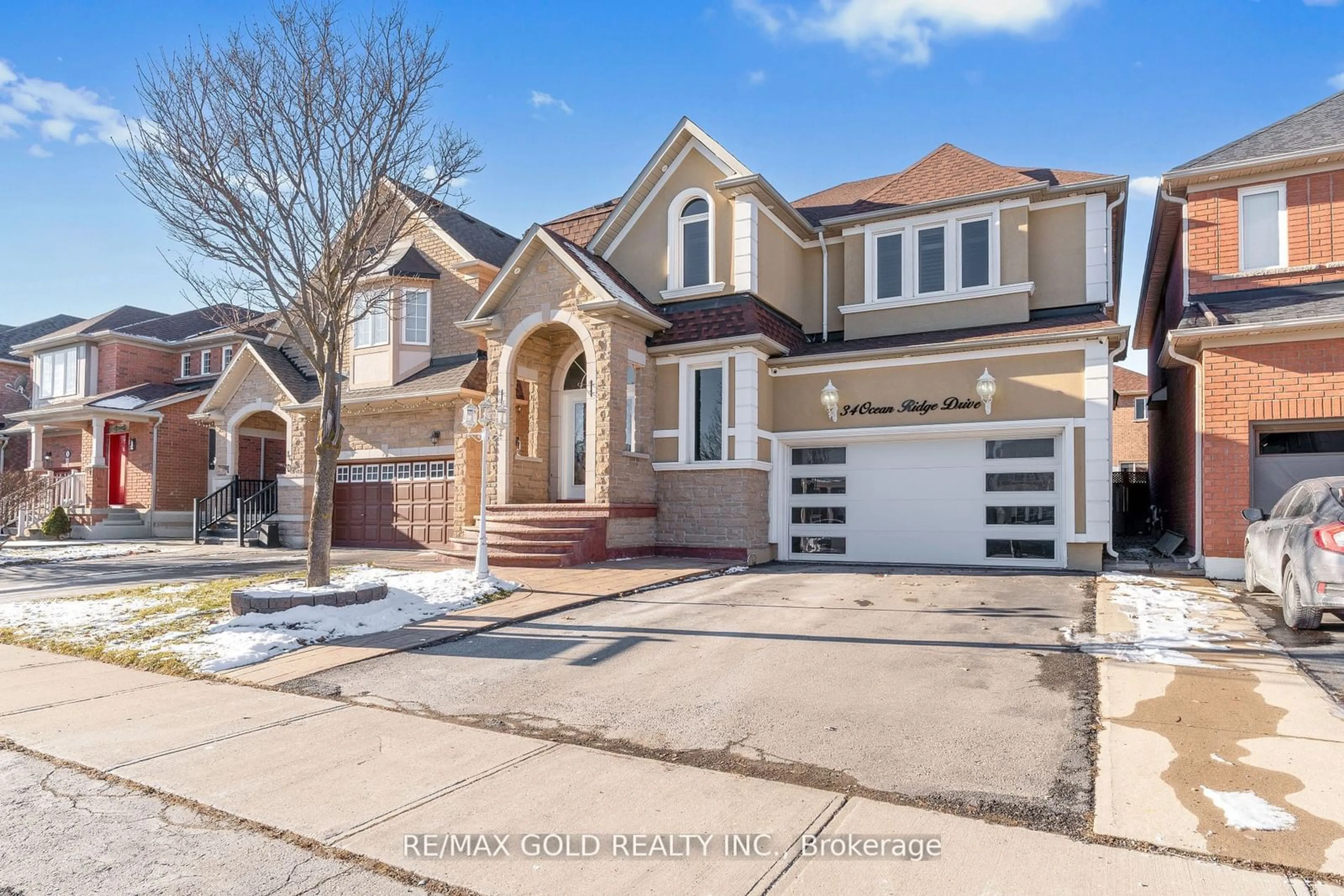 Home with brick exterior material, street for 34 Ocean Ridge Dr, Brampton Ontario L6R 3K5