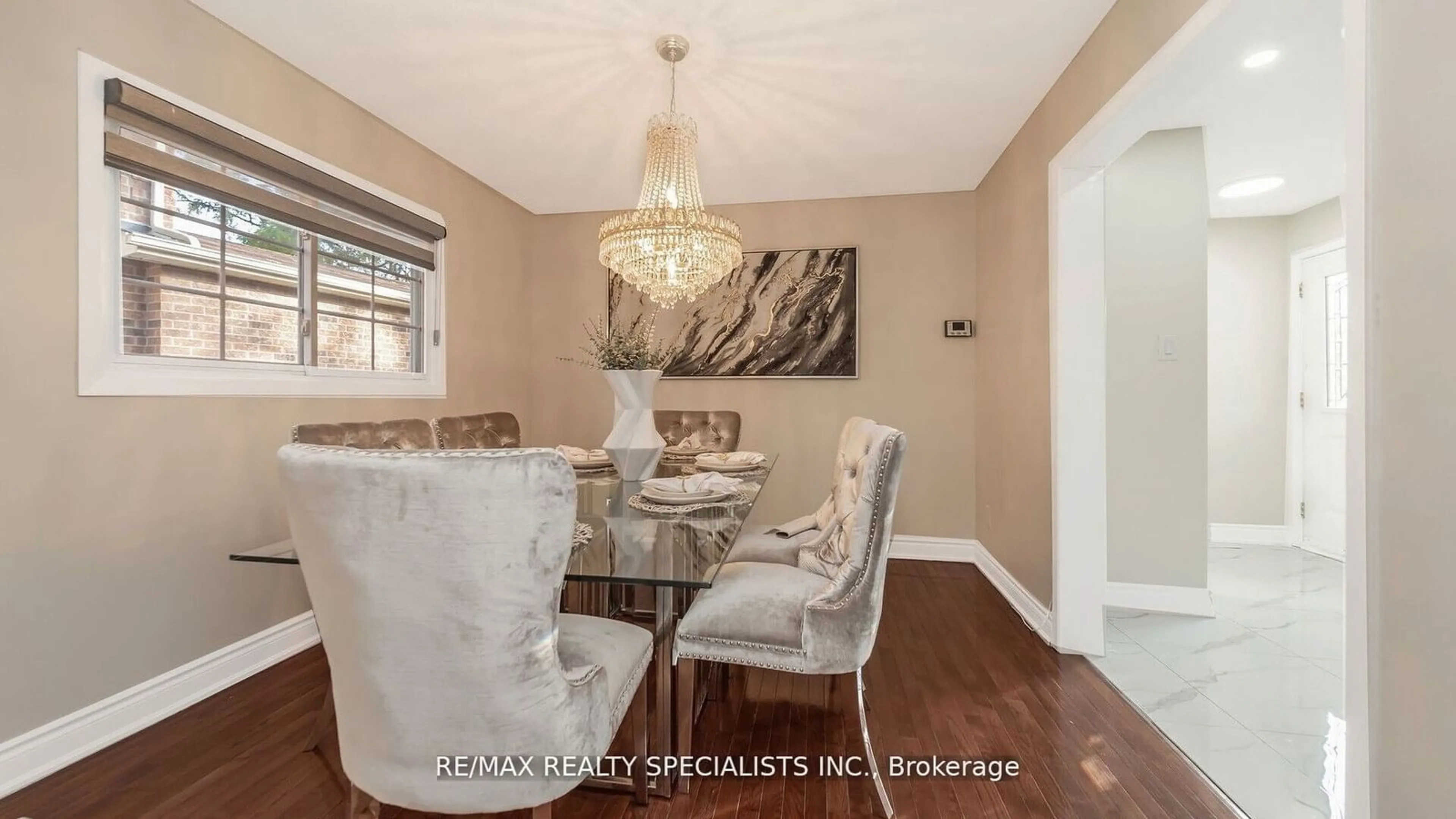 Dining room, wood/laminate floor for 13 Stillwater Cres, Brampton Ontario L6X 3K6