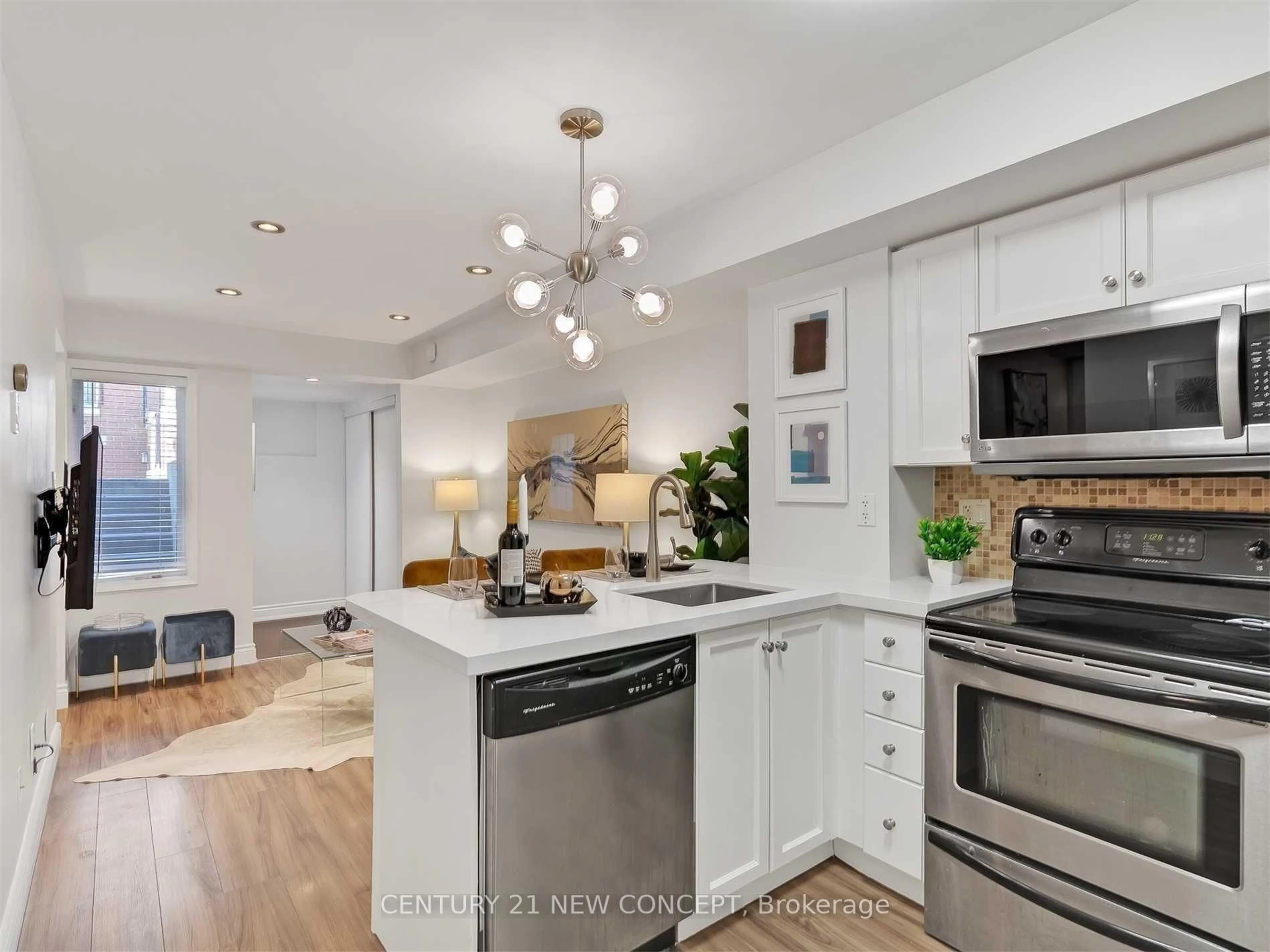 Open concept kitchen, unknown for 10 Laidlaw St #Th725, Toronto Ontario M6K 1X2