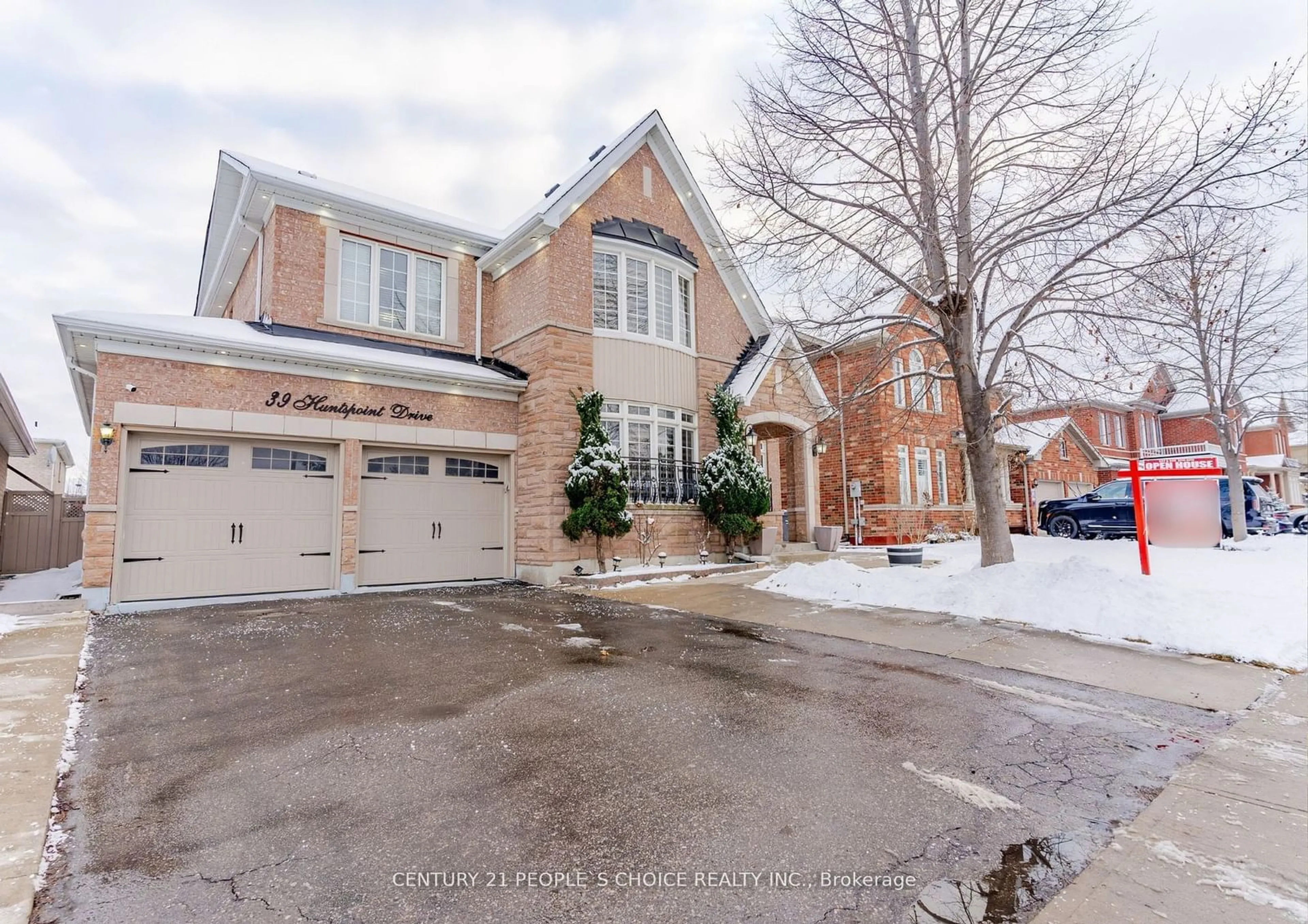 Home with brick exterior material, street for 39 Huntspoint Dr, Brampton Ontario L6P 2E9