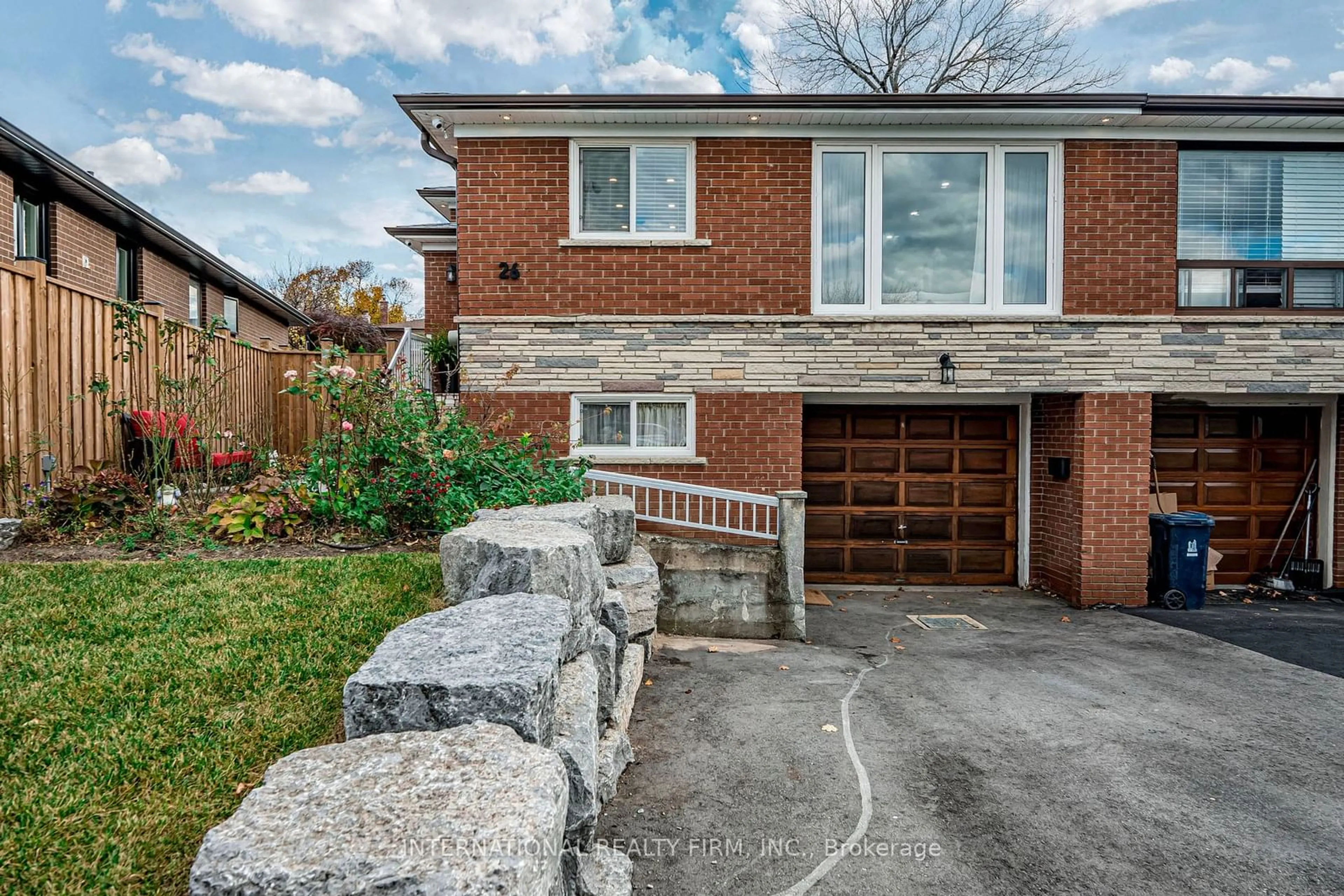 Home with brick exterior material, street for 26 Dellbrook Cres, Toronto Ontario M9L 1E2