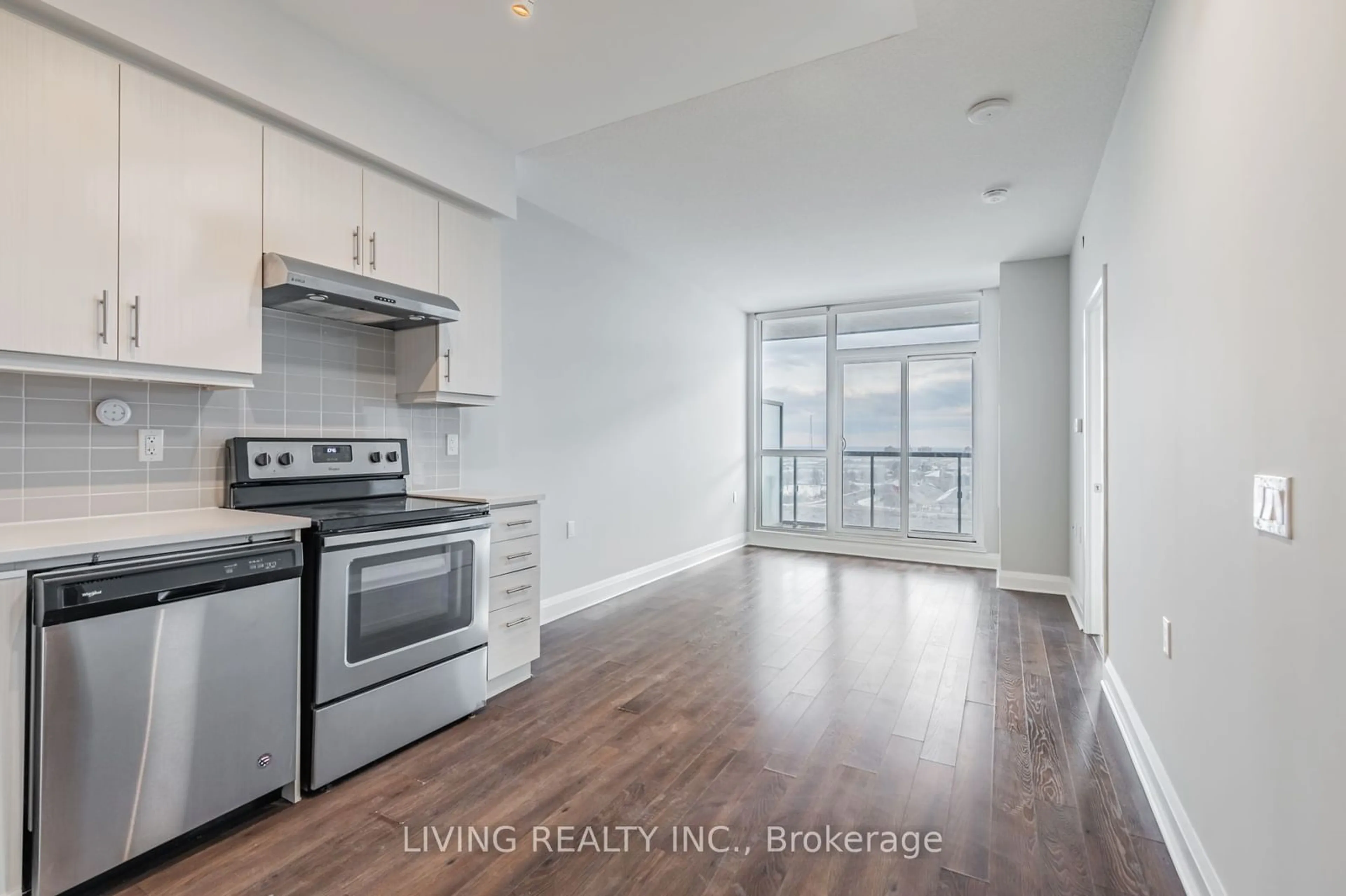 Open concept kitchen, wood/laminate floor for 15 Zorra St #906, Toronto Ontario M8Z 4Z6