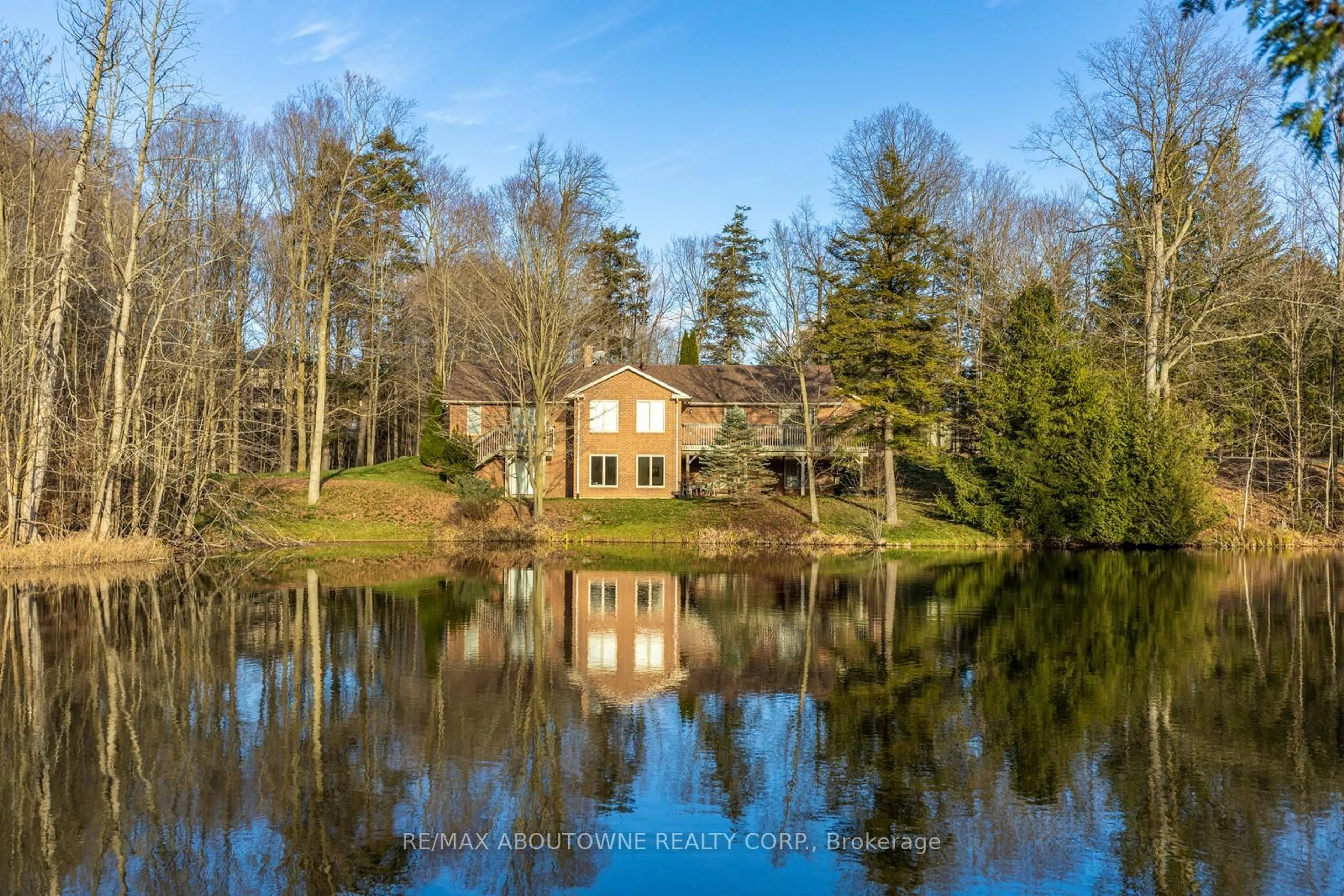 A pic from outside/outdoor area/front of a property/back of a property/a pic from drone, water/lake/river/ocean view for 22 Matson Dr, Caledon Ontario L7E 0A9