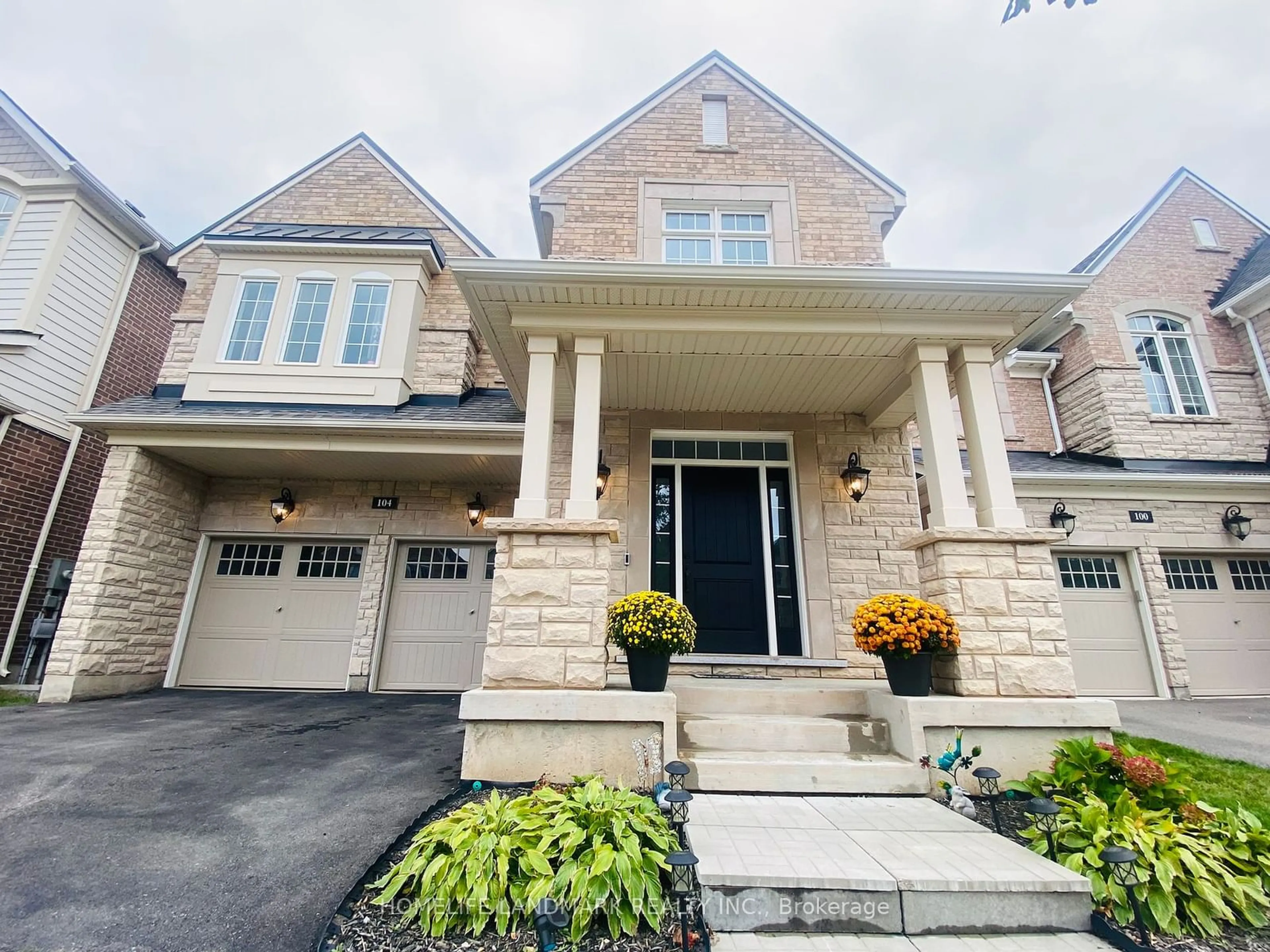 Home with brick exterior material, street for 104 Wheat Boom Dr, Oakville Ontario L6H 7C3