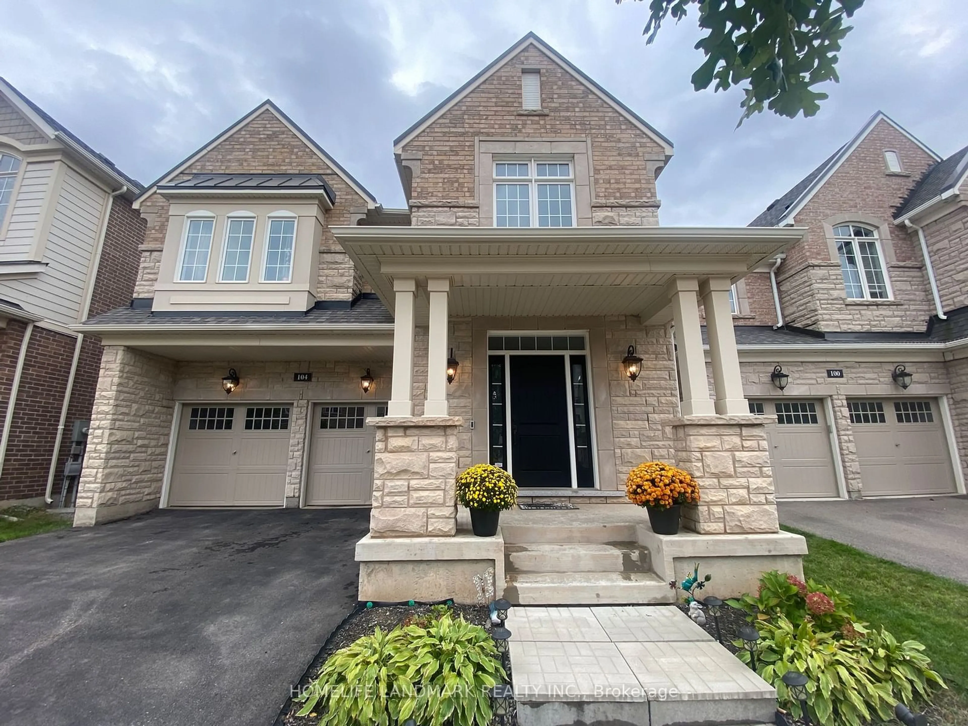 Home with brick exterior material, street for 104 Wheat Boom Dr, Oakville Ontario L6H 7C3