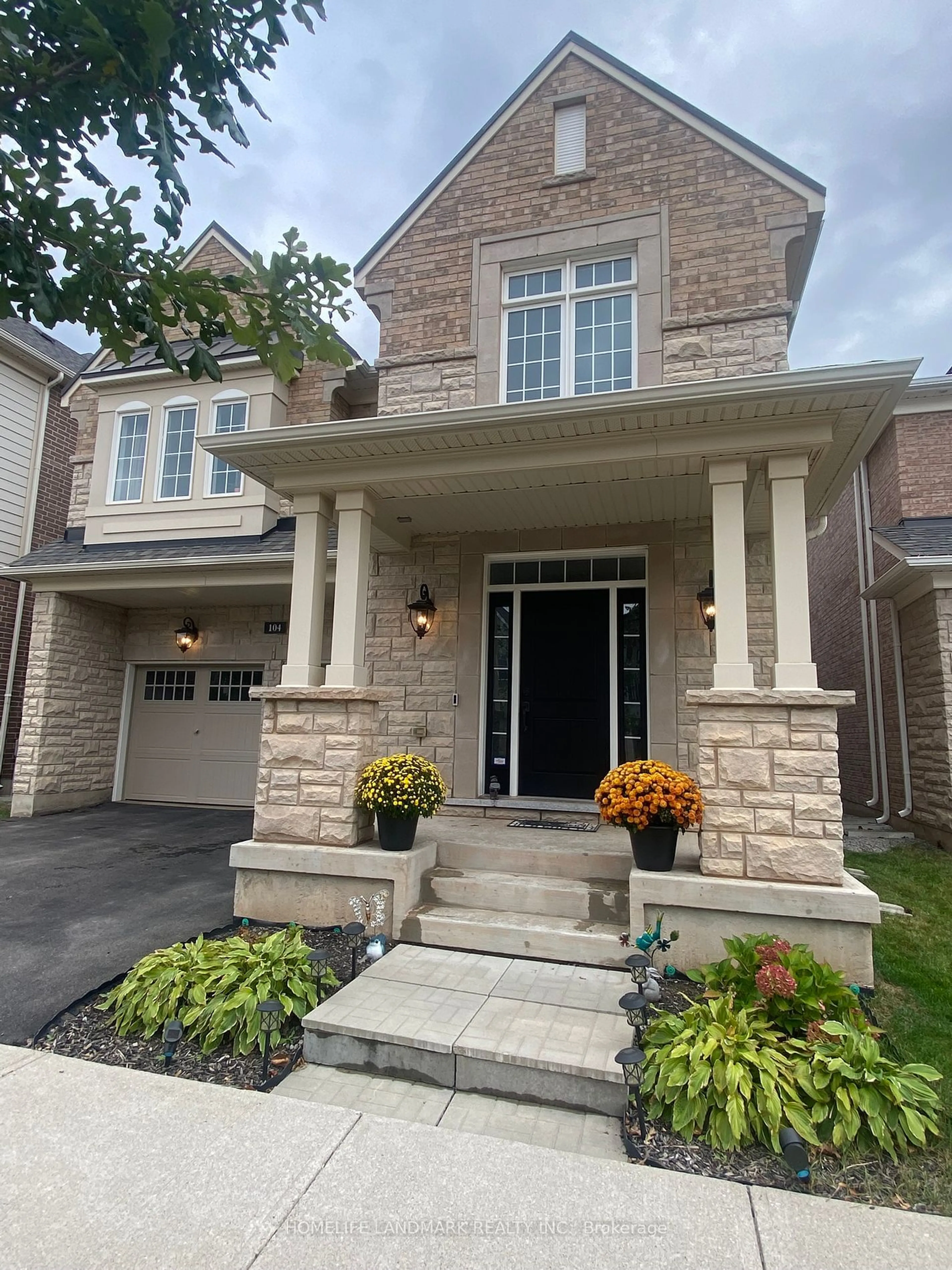 Home with brick exterior material, street for 104 Wheat Boom Dr, Oakville Ontario L6H 7C3