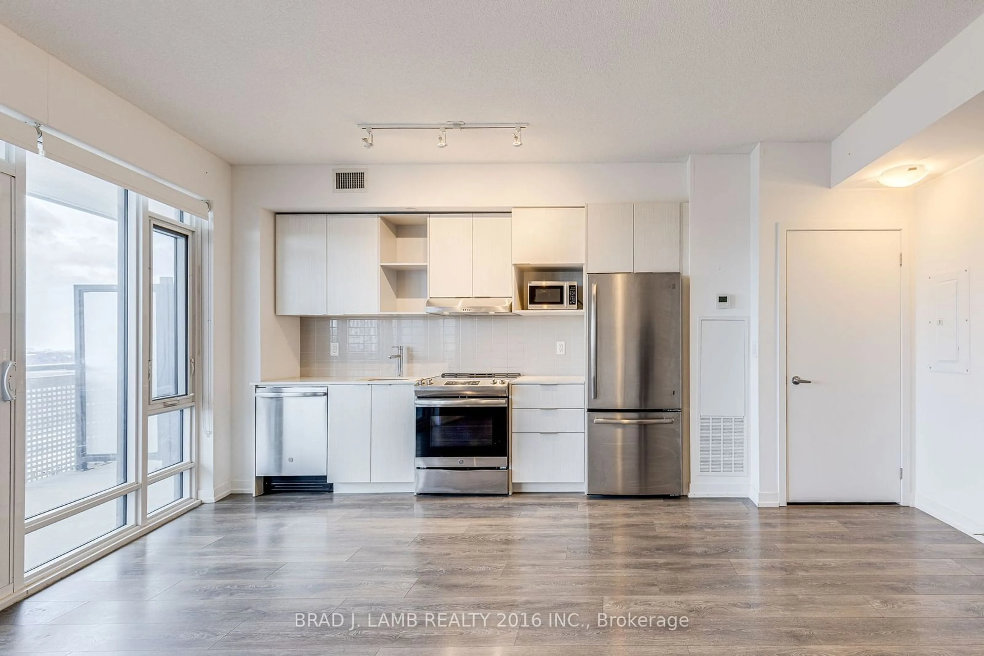 Open concept kitchen, unknown for 2520 Eglinton Ave #1207, Mississauga Ontario L5M 0Y4