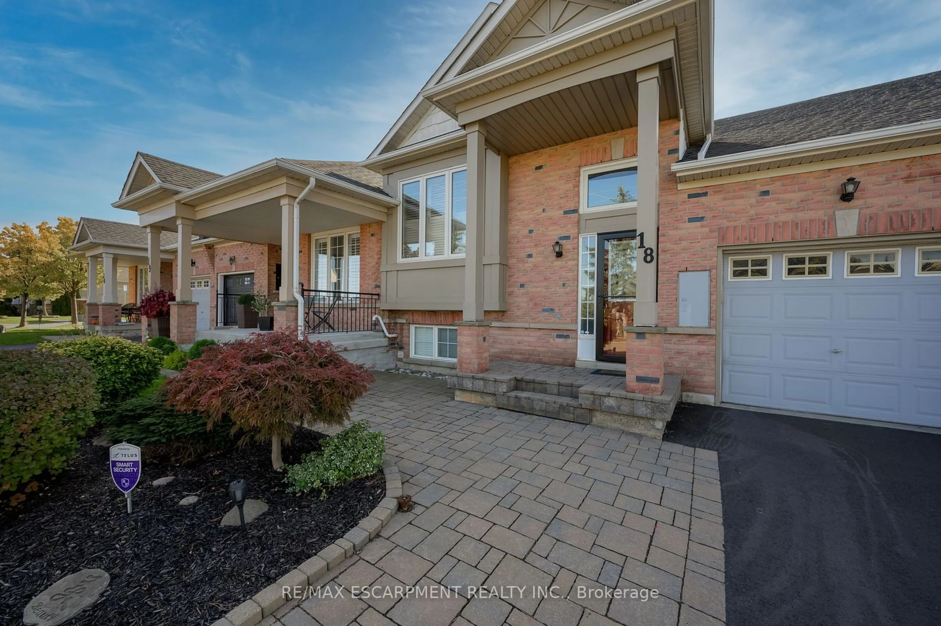 Home with brick exterior material, street for 2243 TURNBERRY Rd #18, Burlington Ontario L7M 4Y4