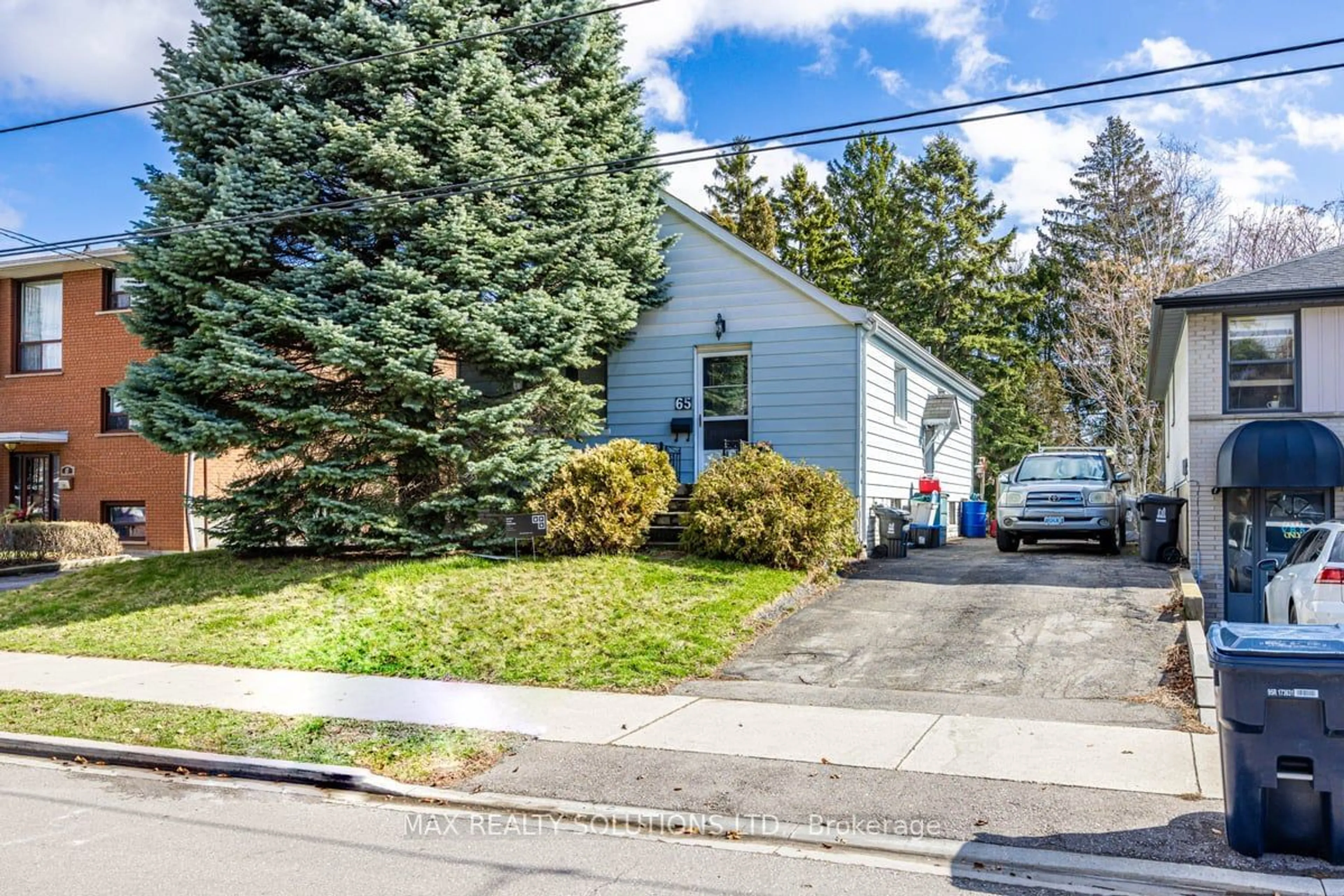 Home with vinyl exterior material, street for 65 Fortieth St, Toronto Ontario M8W 3M8