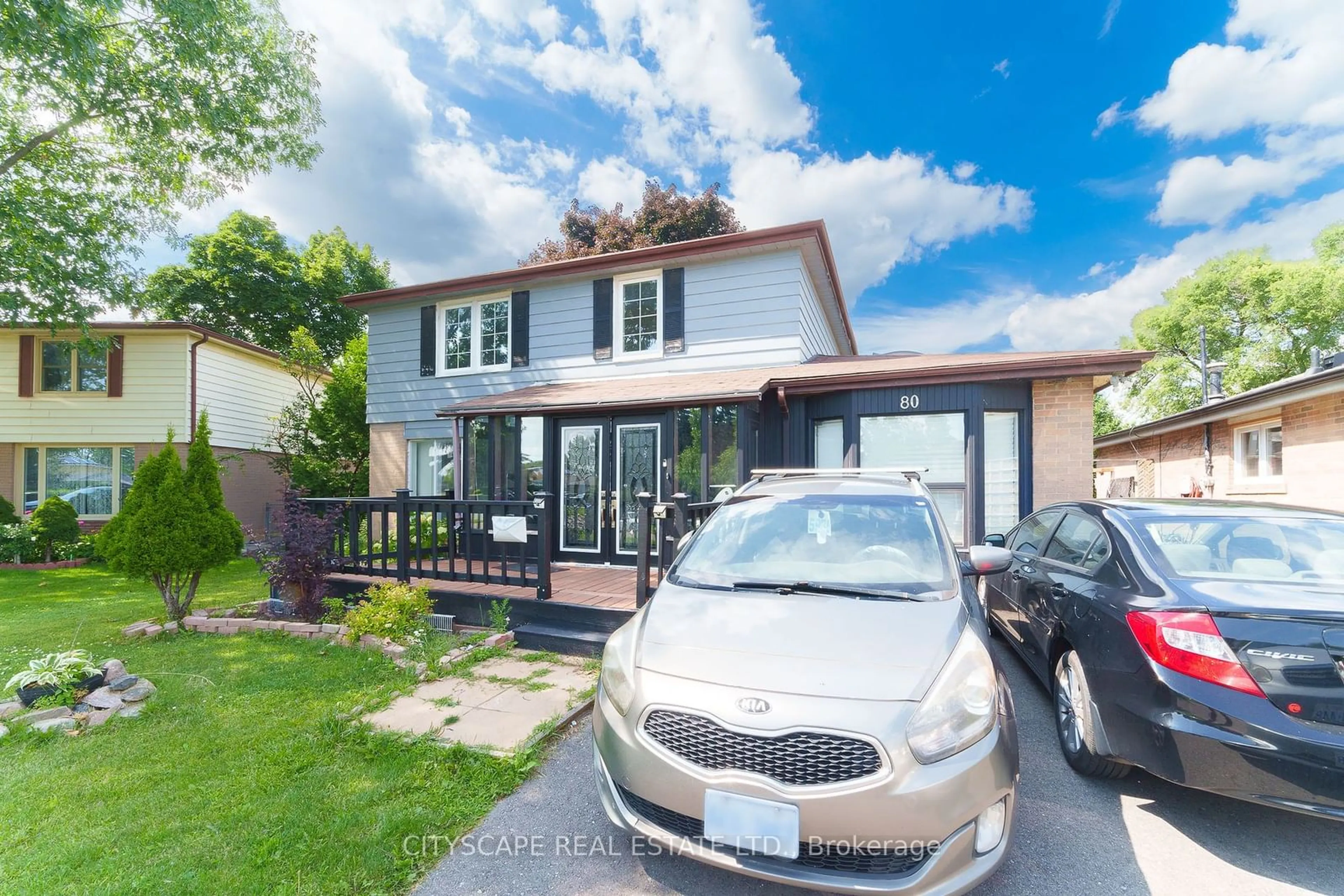 Home with vinyl exterior material, street for 80 Brookland Dr, Brampton Ontario L6T 2M5