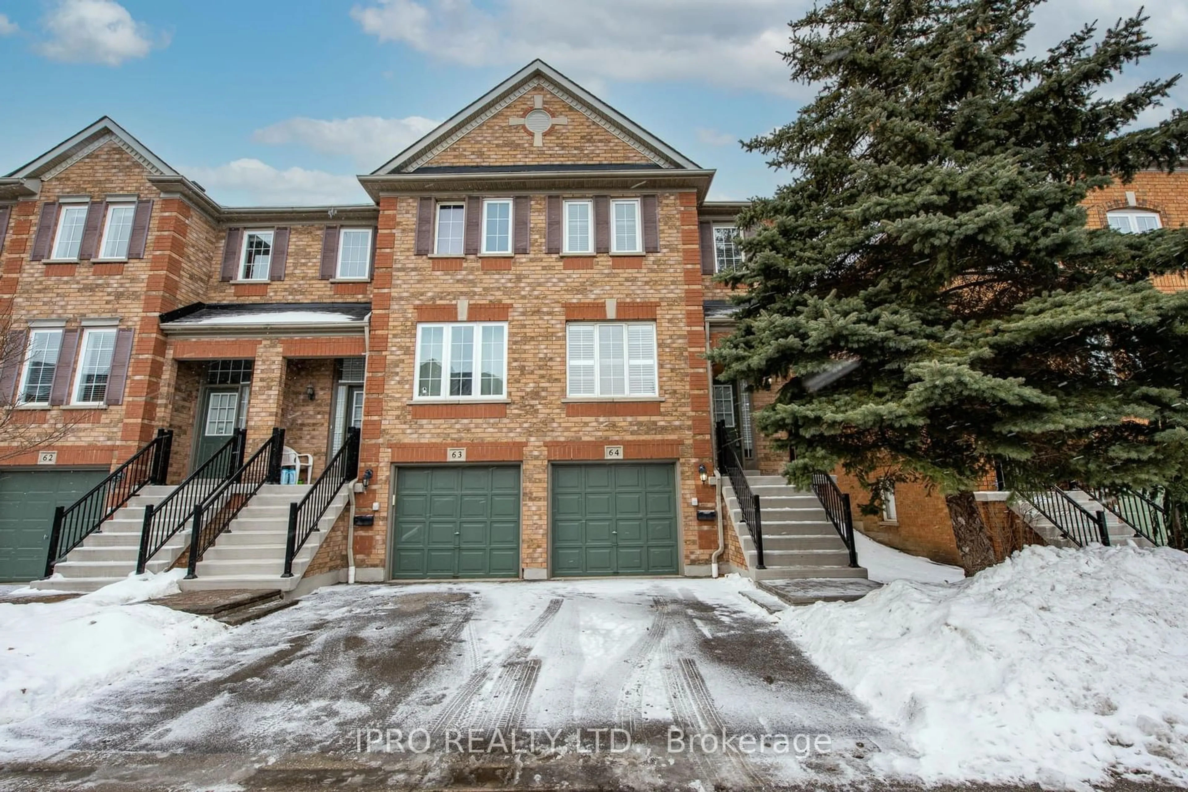 Home with brick exterior material, street for 5530 Glen Erin Dr #64, Mississauga Ontario L5M 6E8